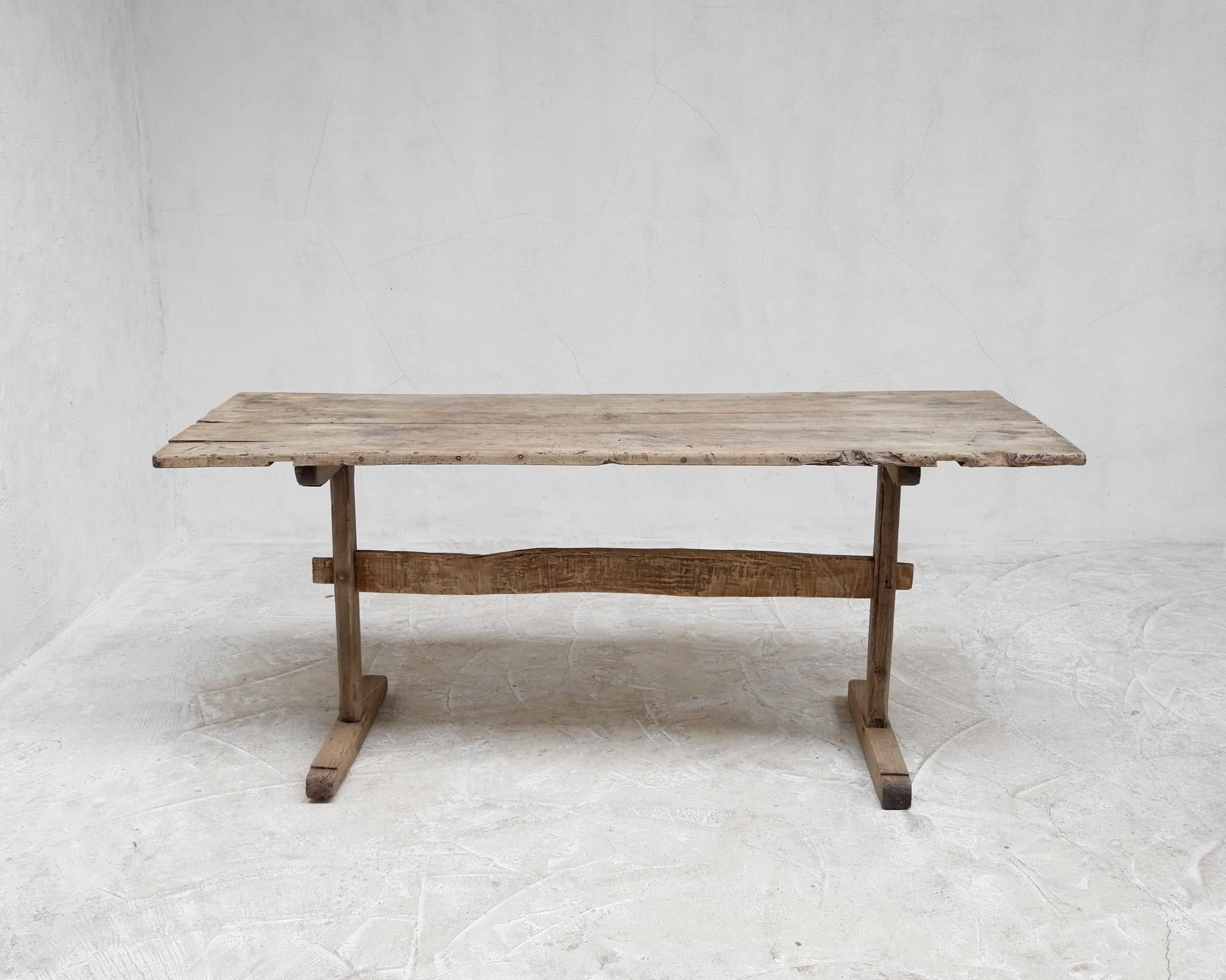 A rare early 19th C. northern Italian “T” table.

Aesthetically pleasing utilitarian design.

Lovely washed-out colour.

-

We offer free shipping to the USA/Canada through Fedex with this item.