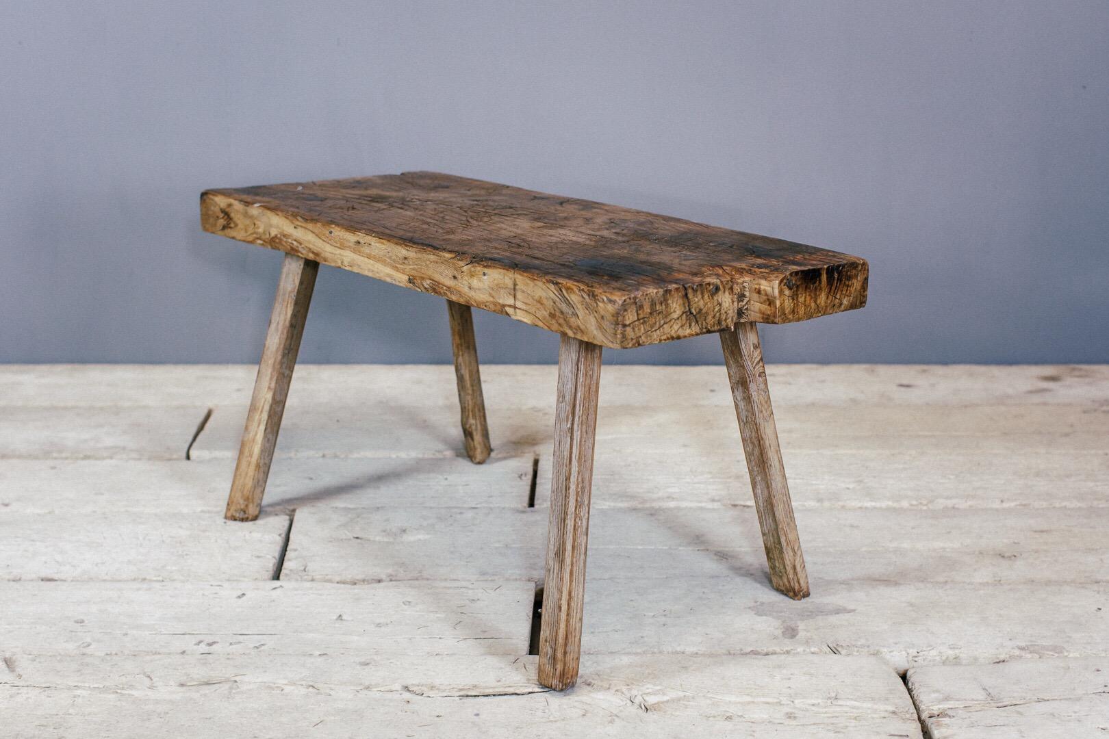 Primitive early 20th century slab table or pig bench, wonderful wear and patina from use, France.
 