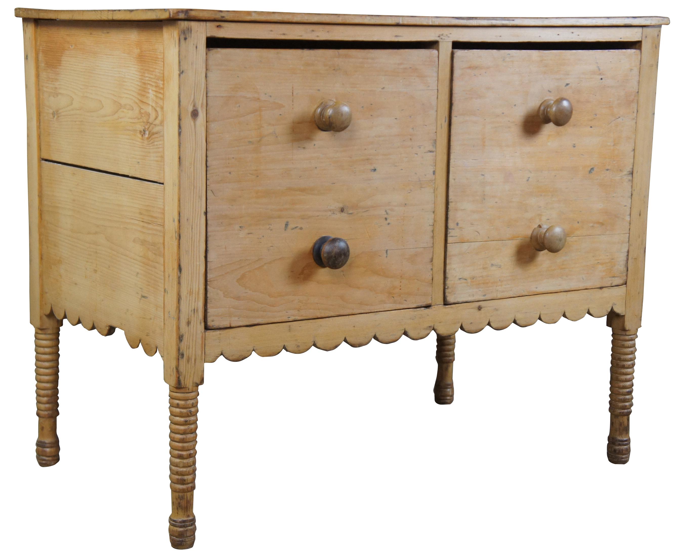 Antique 19th century early American pine chest. Features two large hand dovetailed drawers making for perfect use as a dough bin slash box. Includes carved aprons and ribbed legs.
 