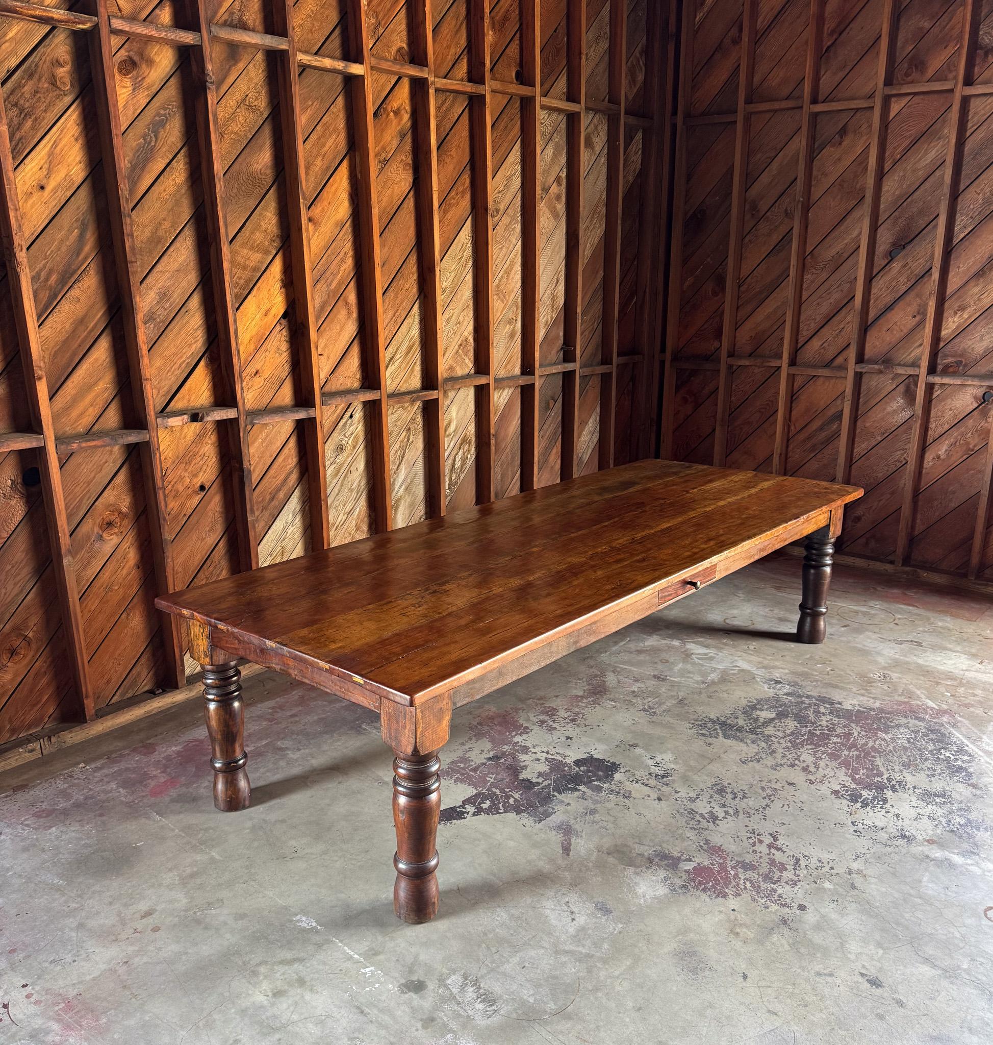 Primitive 10ft Long Farmhouse Dining Table.  Exposed joinery to the table top edge.  Warm patina throughout. 
