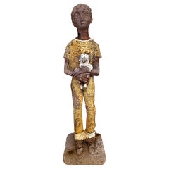 Figura primitiva de un niño sujetando a un perro