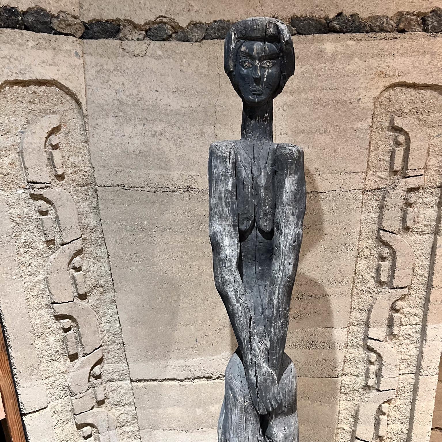 Primitive French Hand Carved Standing Femme Female Wood Sculpture
Wood hand crafted design mounted on Raw Stone Base
In the style of Giacometti ideal for Jenerette Picasso & Prouvé fans.
71 h with Stone Base, Wood 65 h x 11 d x 9 w Stone 6 h x 16 d