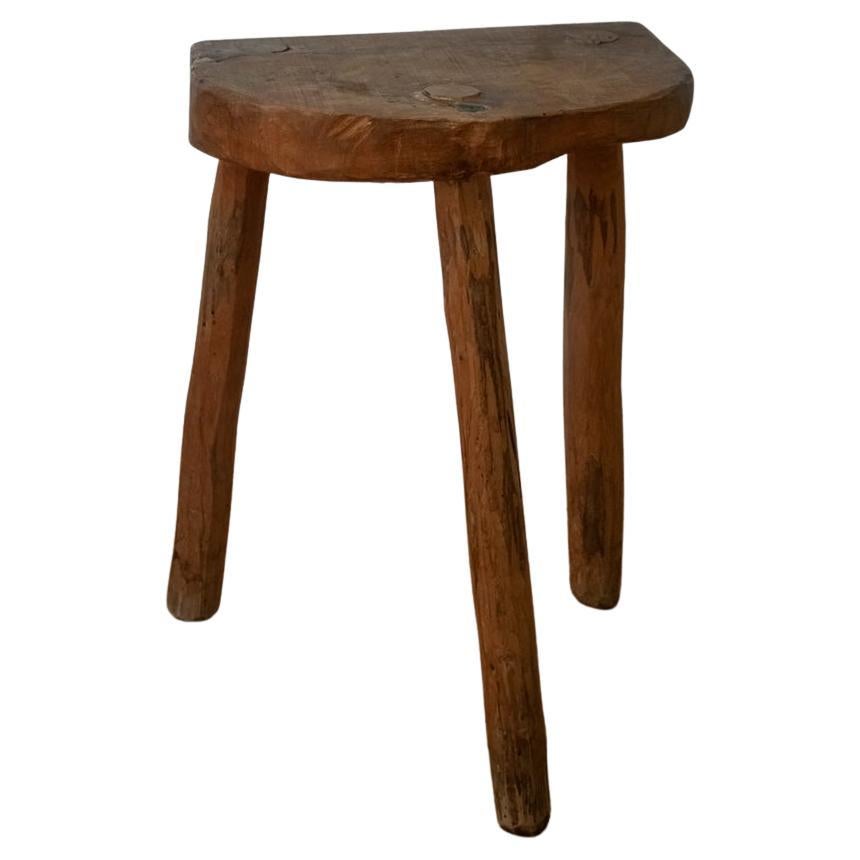Primitive french three legged wood stool For Sale at 1stDibs