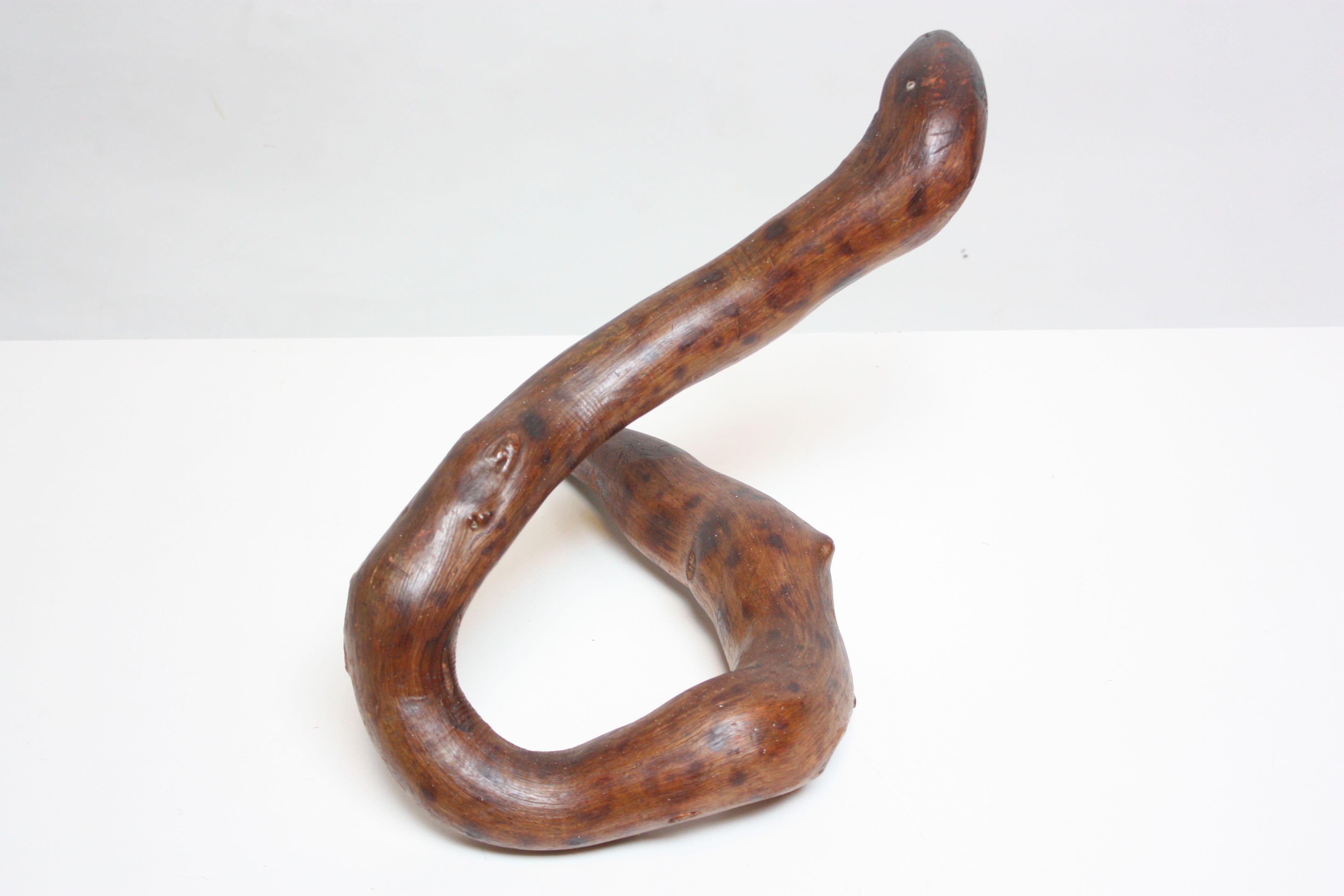 wooden snake sculpture