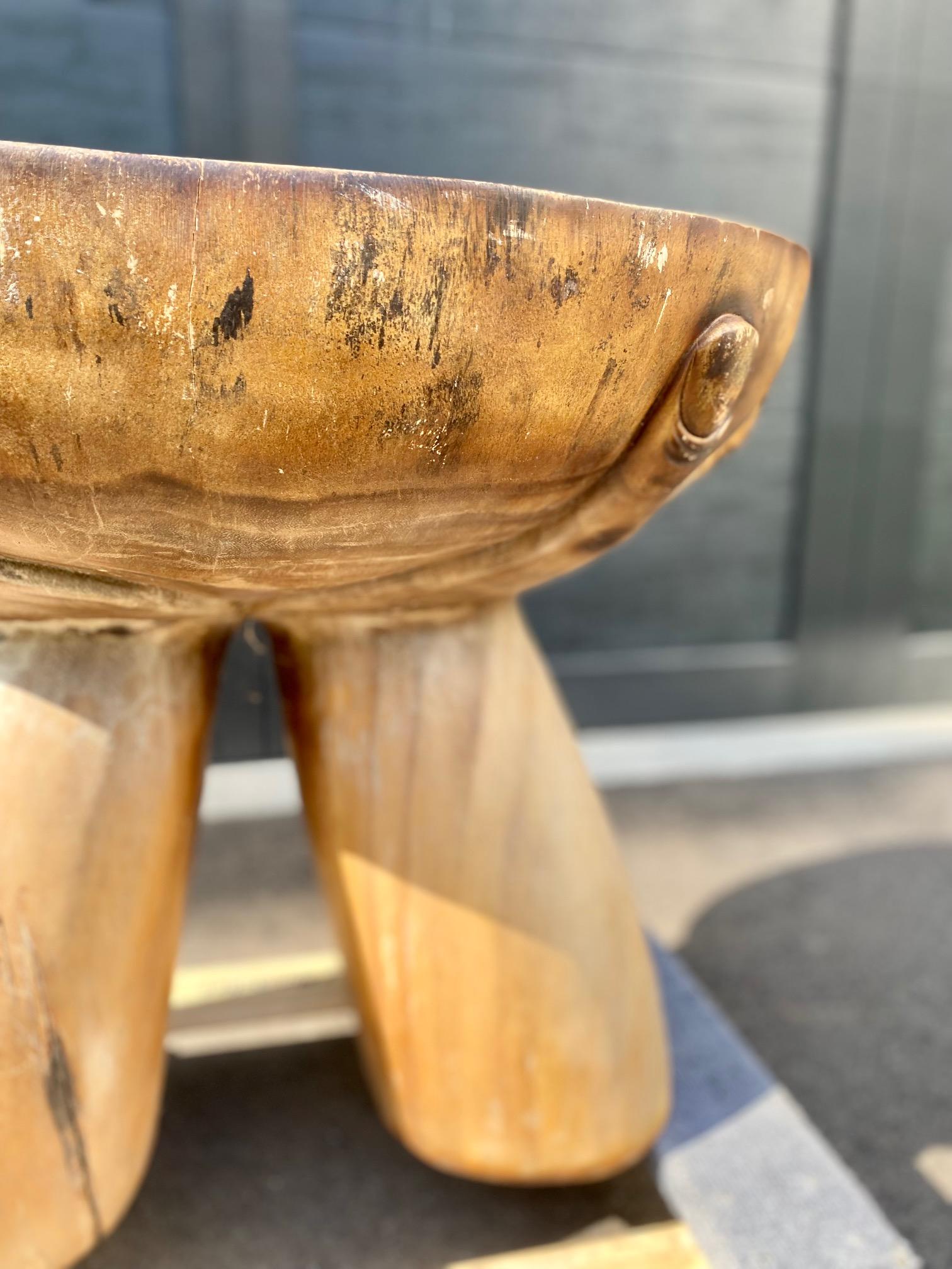 Hand-Carved Primitive Handmade Wood Accent Table with Hand Motif For Sale
