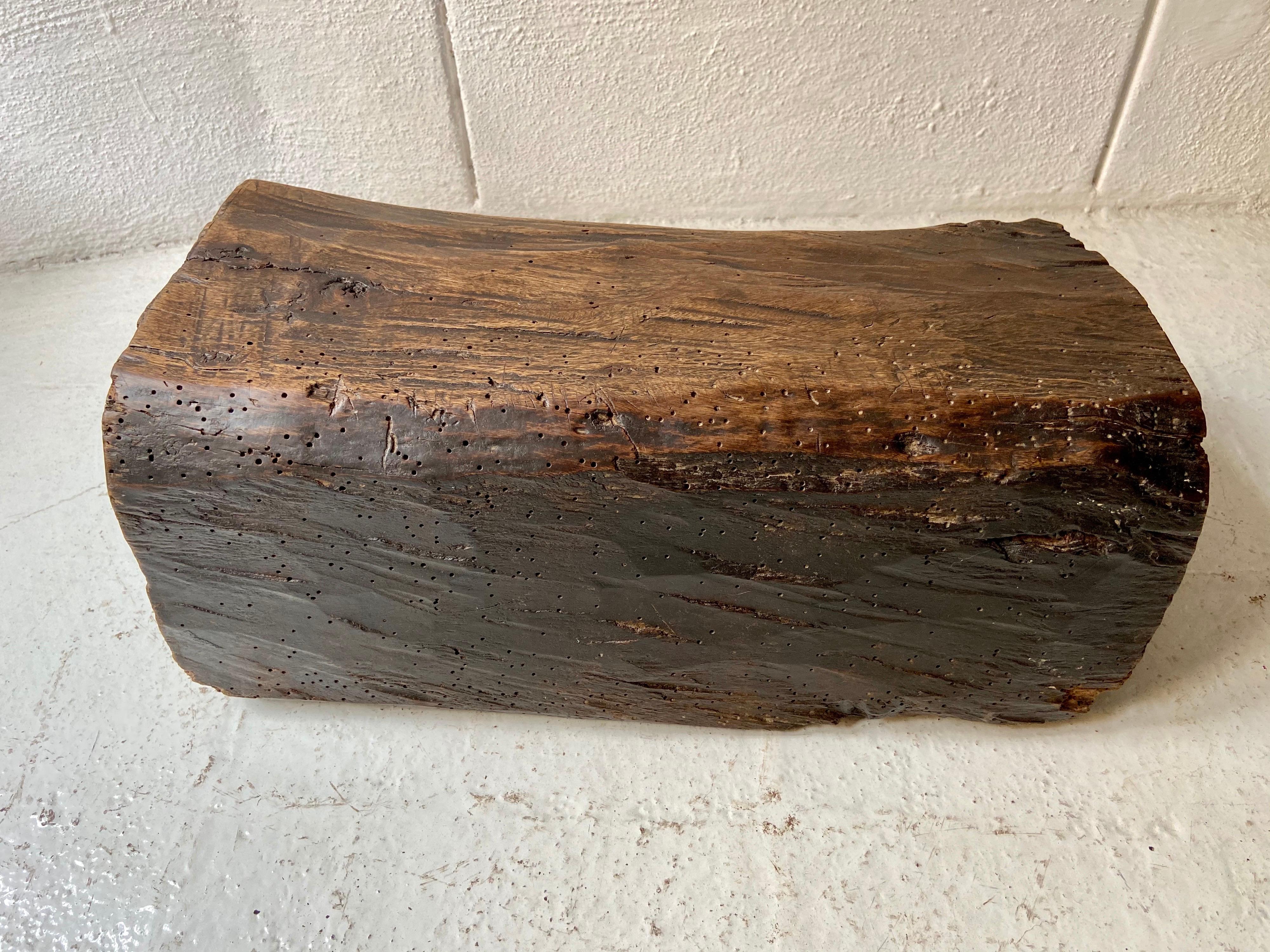 Rustic, hollowed out block stool from the northern mountains of Tonalixco, Puebla. These are typically used by the fire to congregate and eat together. The patina on these pieces is important to note as a sign of their age and use.