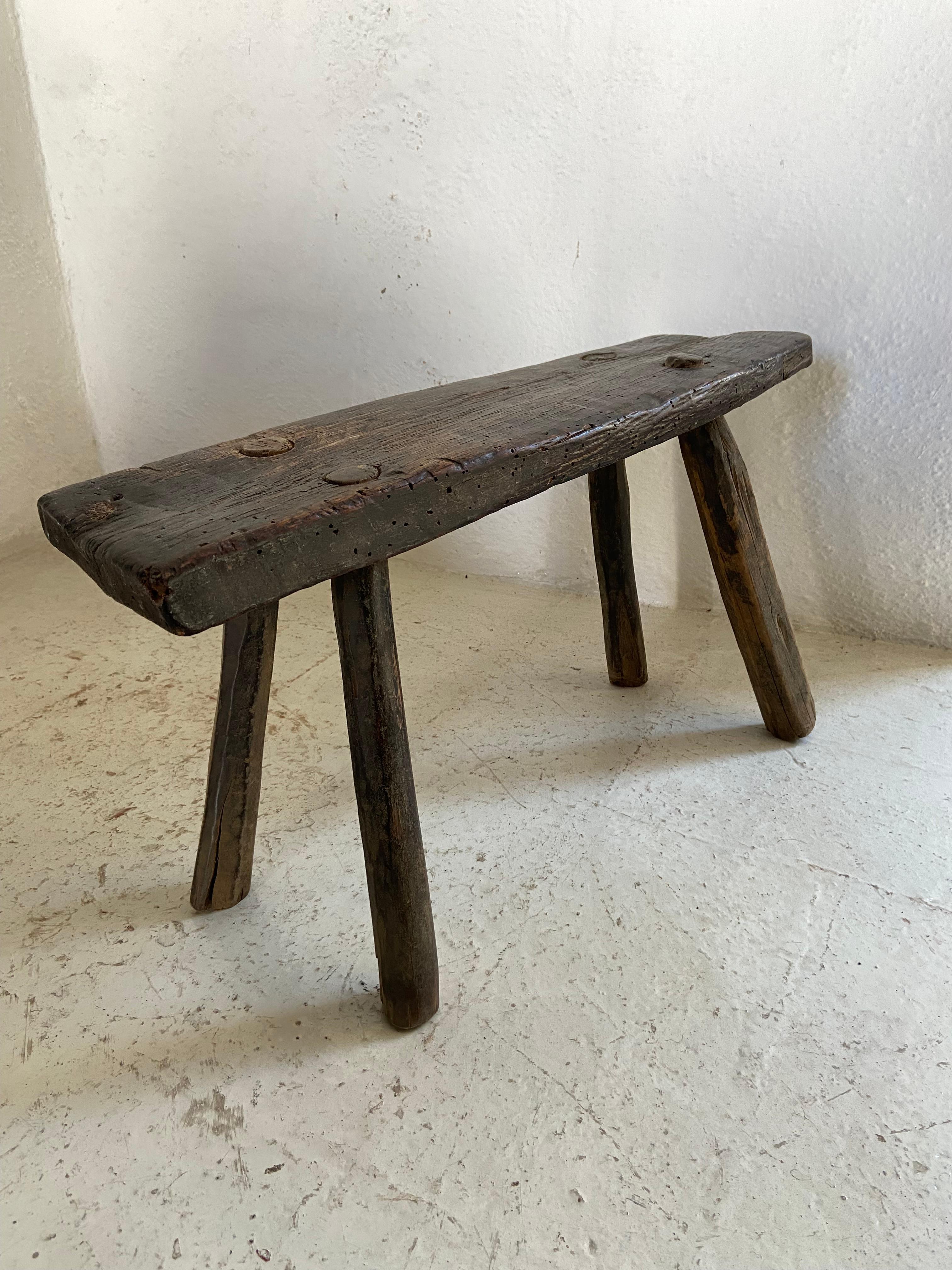 Primitive Hardwood Stool by Artefakto
Unique piece.
Dimensions: D 16 x W 55 x H 28 cm.
Materials: Hardwood.
Guanajuato, Mexico 1950 ´s.

Artefakto opened its doors on the Riviera Nayarit coastline in 2010. With an unrelenting passion for all