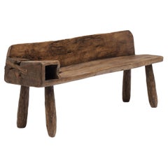 Banc rustique à oreillers taillés