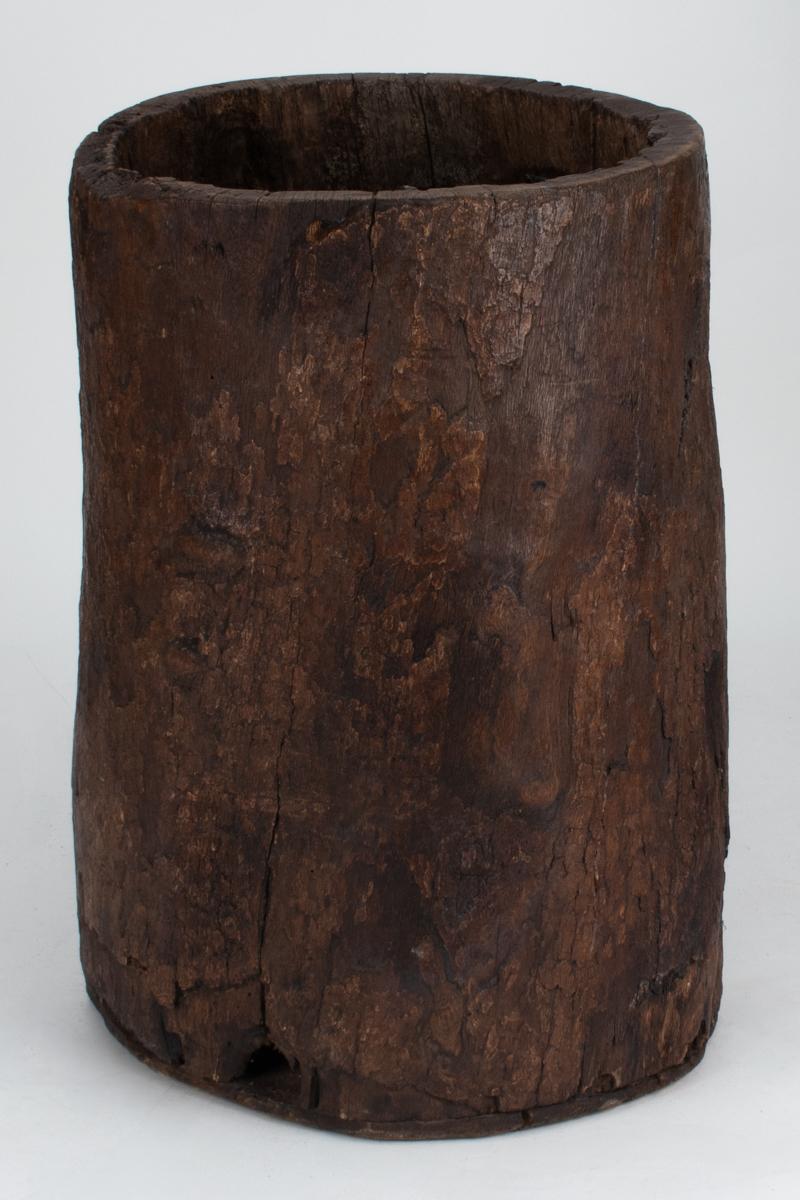 Primitive Hollowed Tree Trunk Vessel, Belgium ca. 1900

A powerful example of primitive craftsmanship, this hollowed tree trunk vessel from Belgium is carved from a single solid section of wood, retaining its organic cylindrical form and deeply