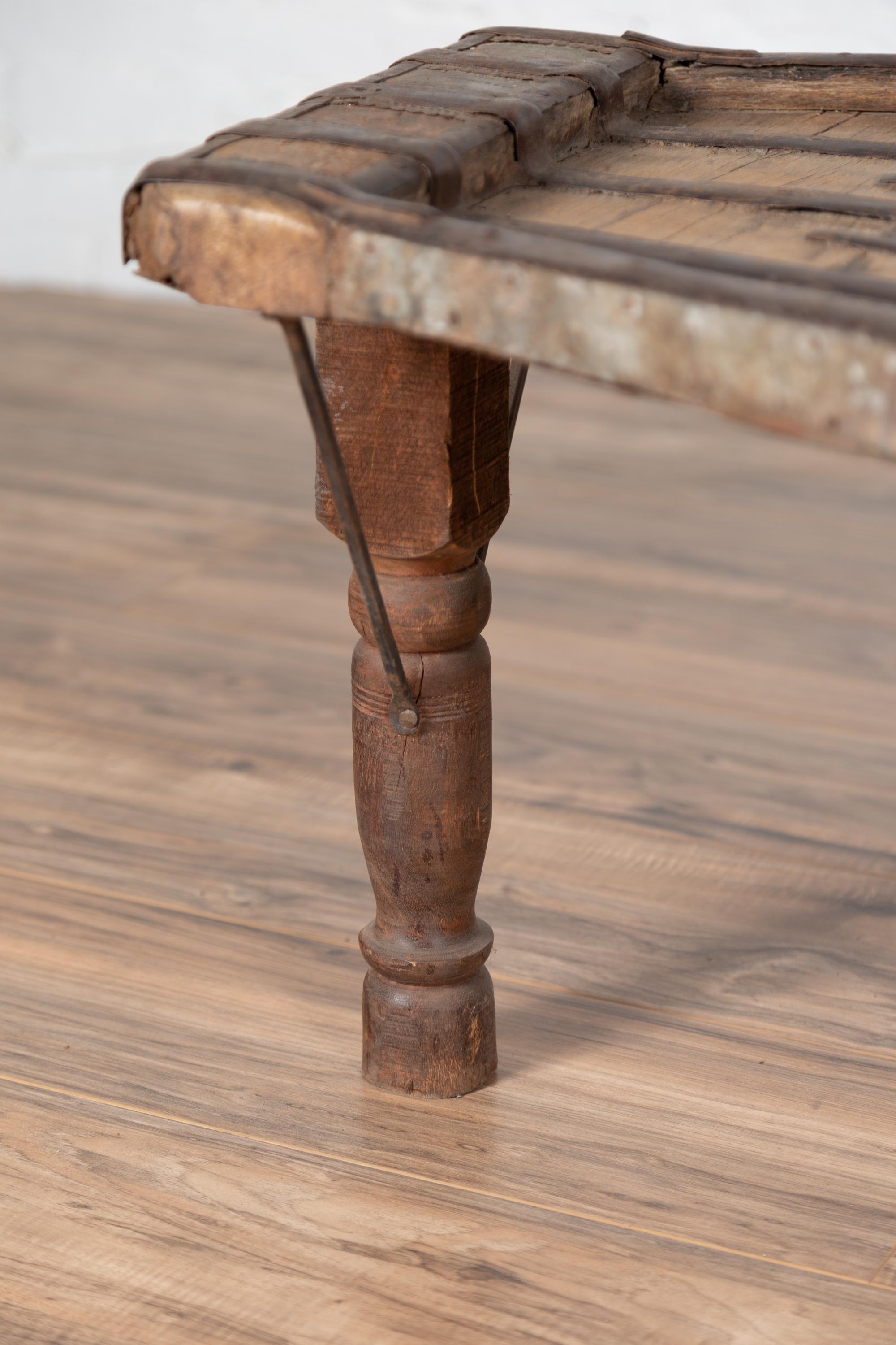 Indian Bullock Cart Coffee Table with Metal Braces and Turned Legs 5