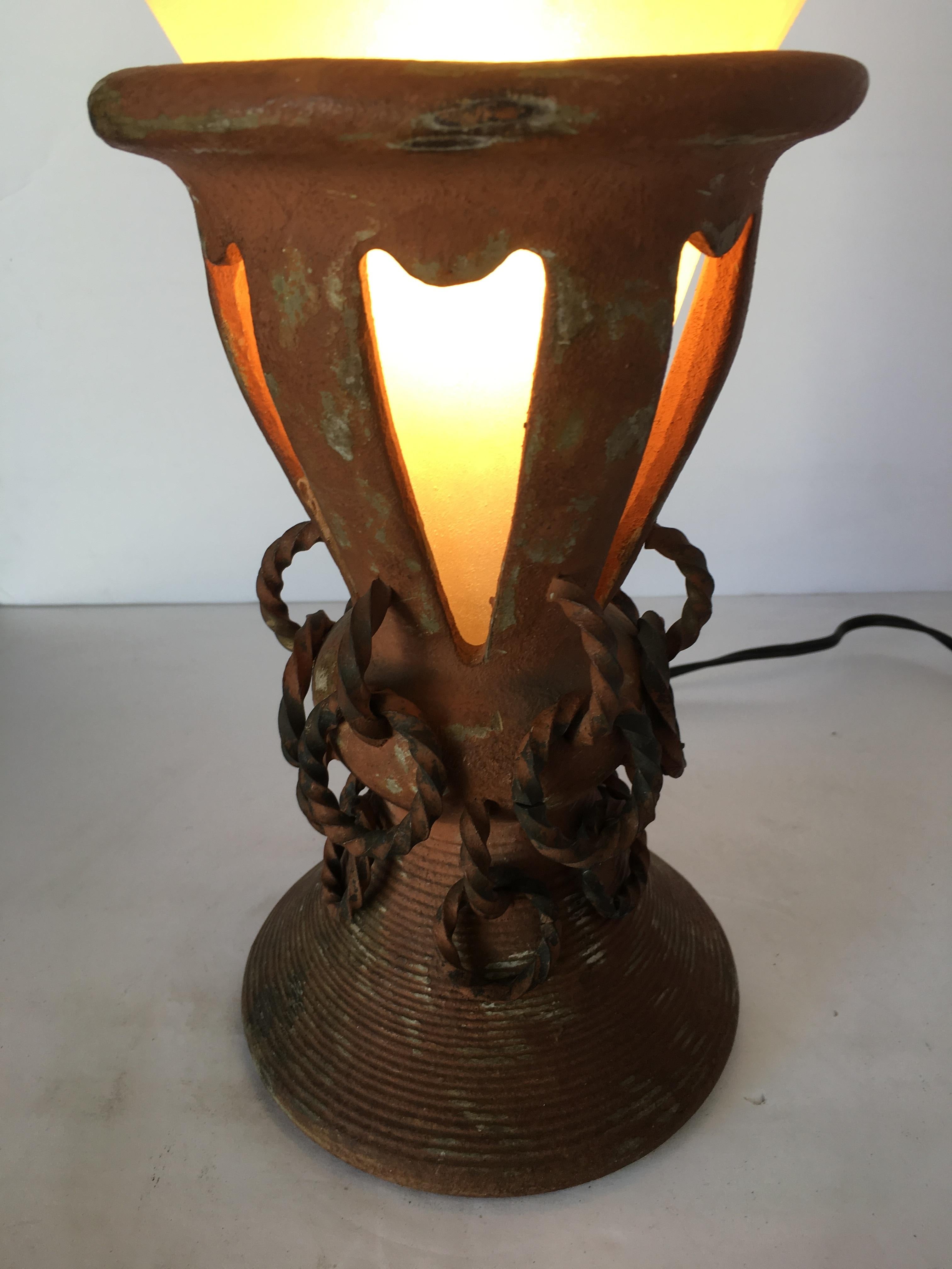 Electric iron and clay torchiere table lamp with frosted shade. Available-2