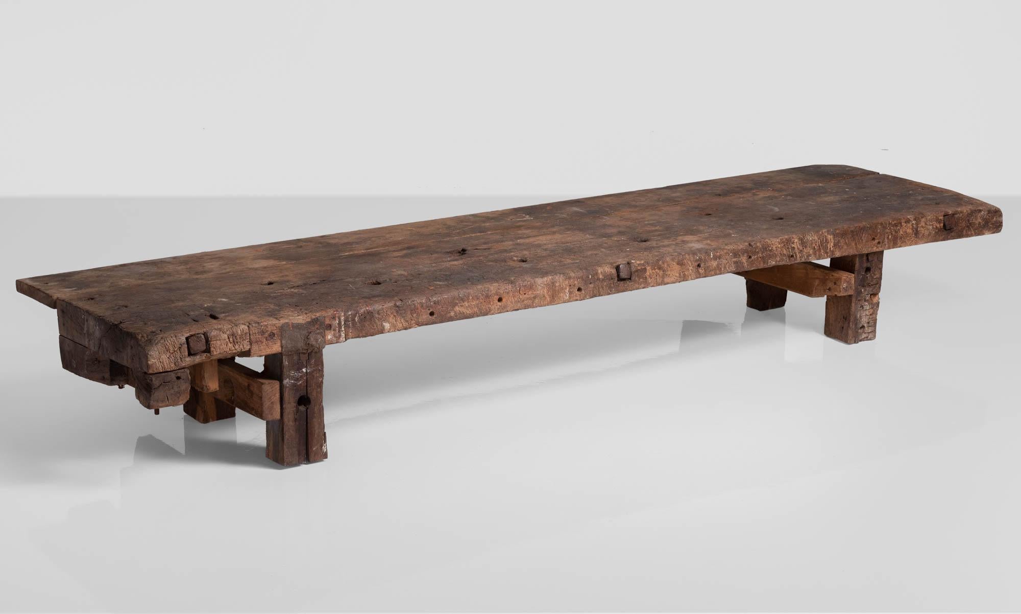 Primitive low table with hidden storage, France, circa 1880.

In an incredible size with one segment of the top, which opens to reveal storage.