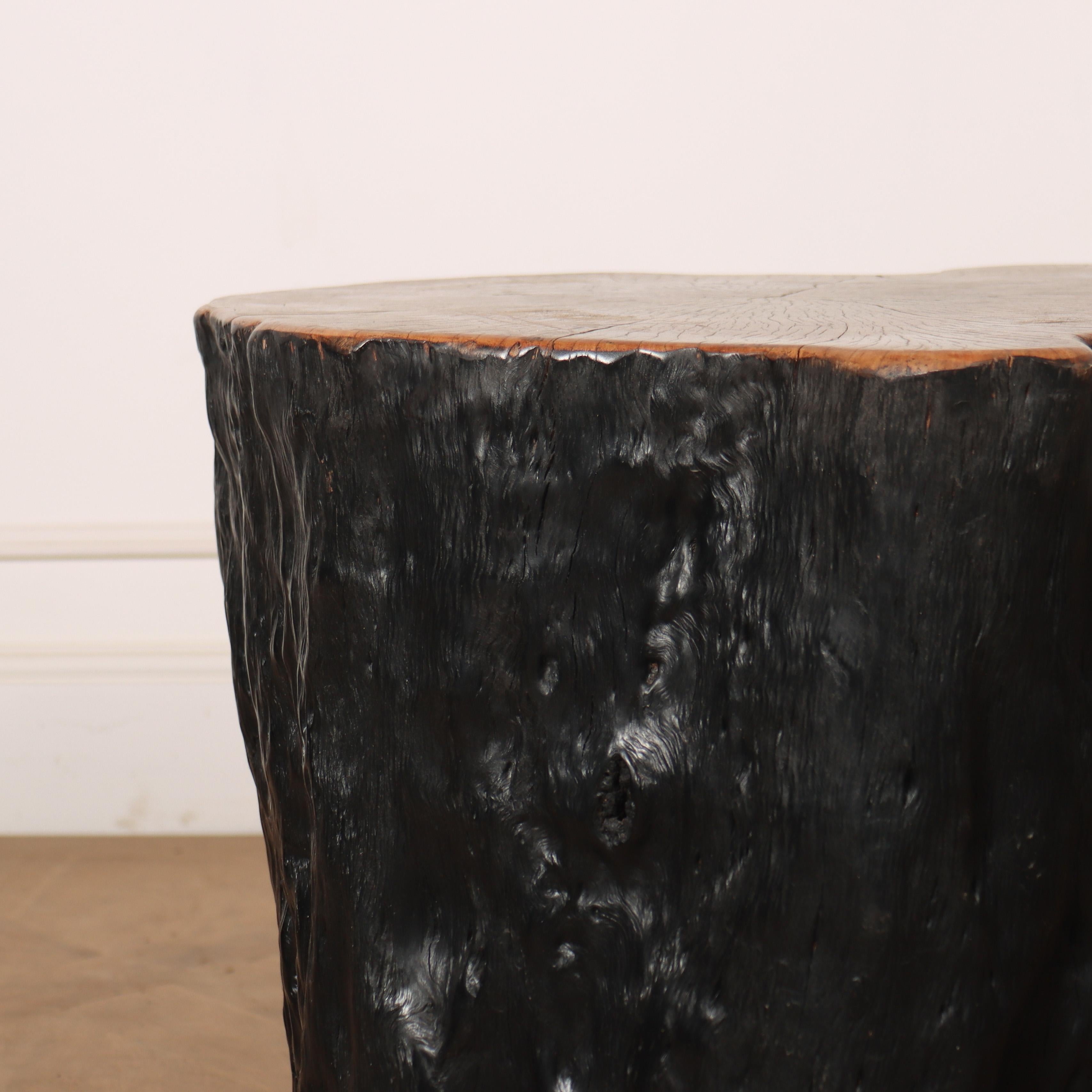 Primitive lychee side table. Hand carved and finished using a Japanese technique called Shou-Sugi Ban.

Reference: 8153

Dimensions
20 inches (51 cms) High
21 inches (53 cms) Diameter