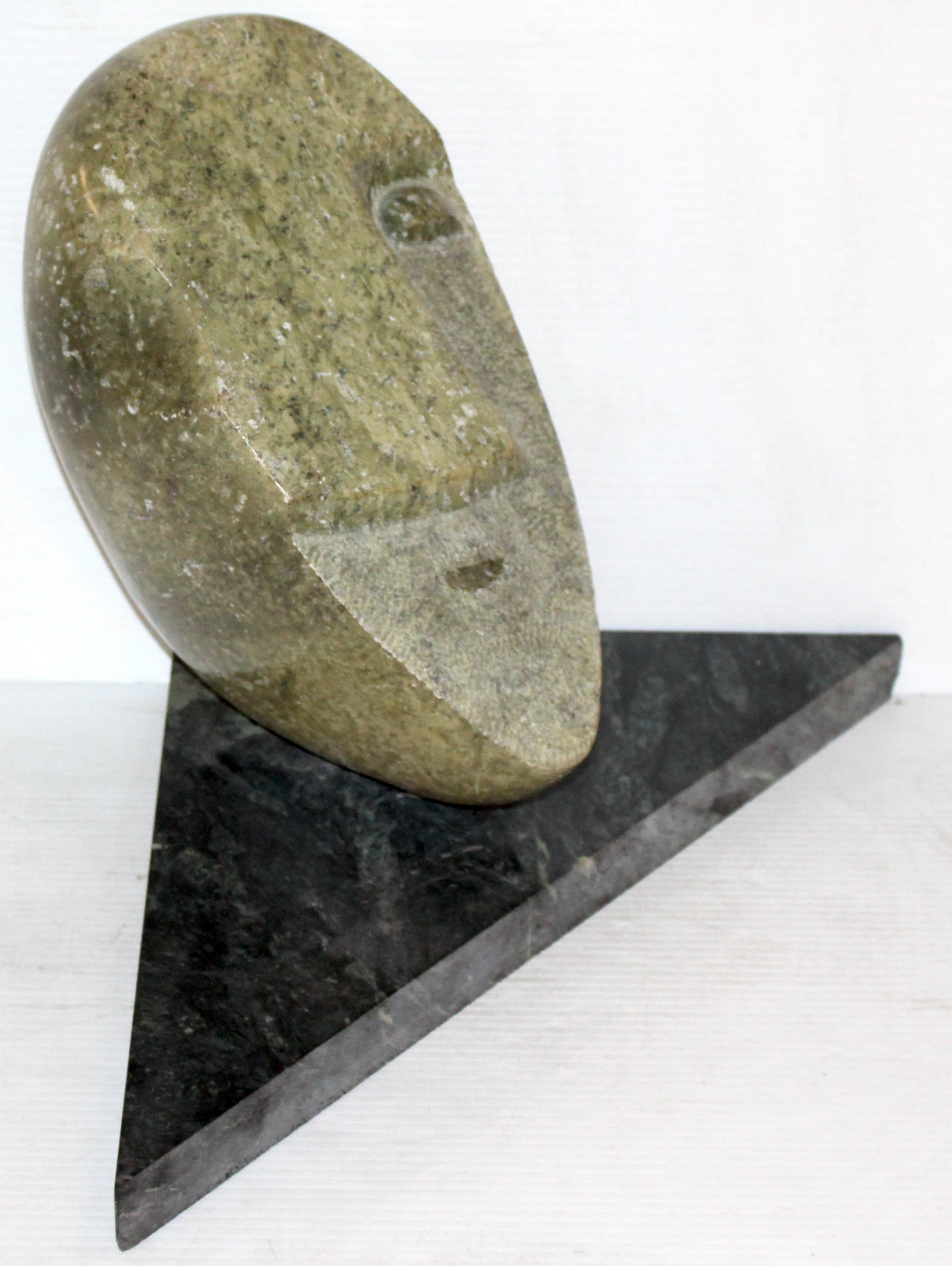 Unknown Primitive Modern Stone Face Carving with Marble Base For Sale