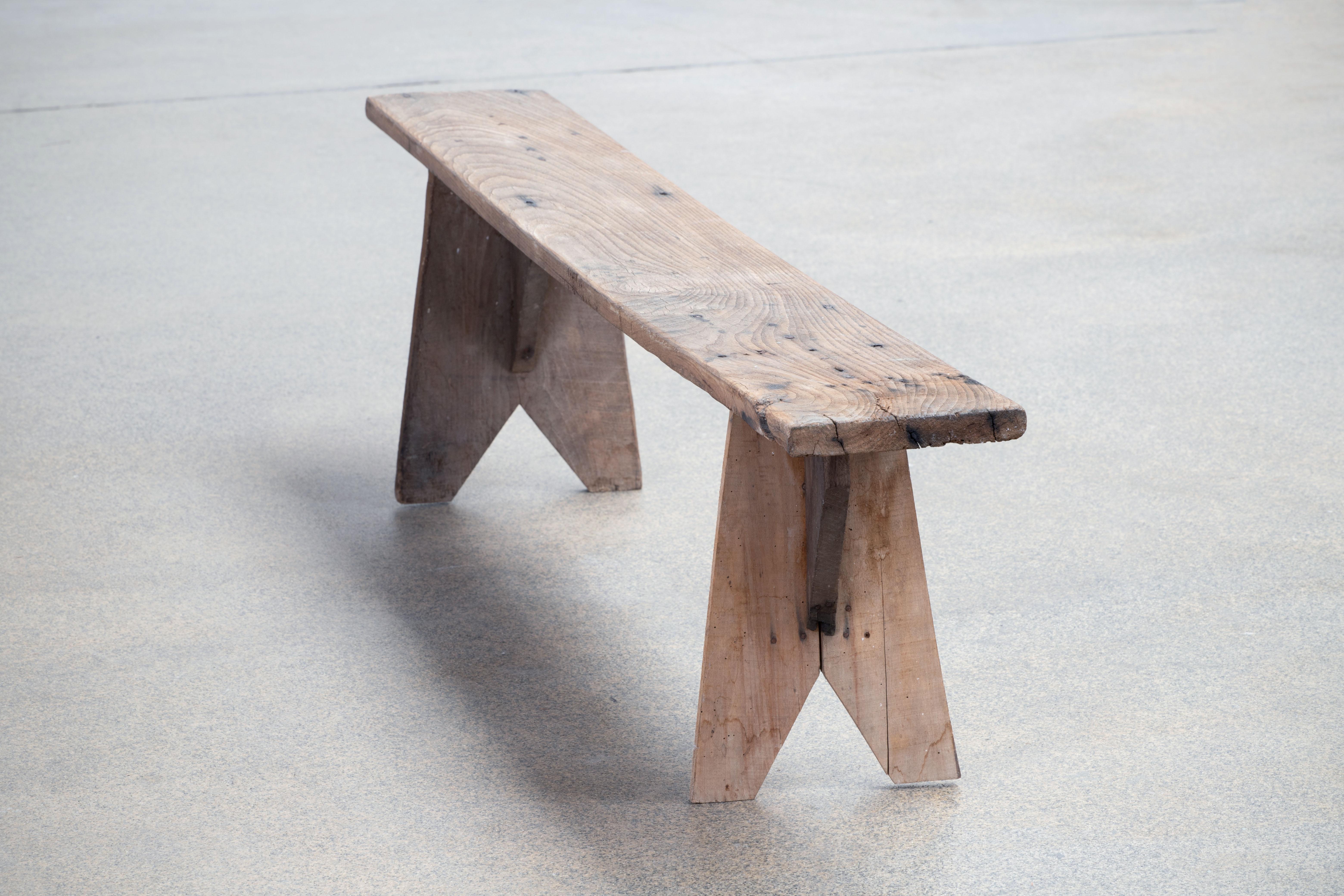 Oak primitive bench from France. 
Original wood finish with great age markings and patina.
 