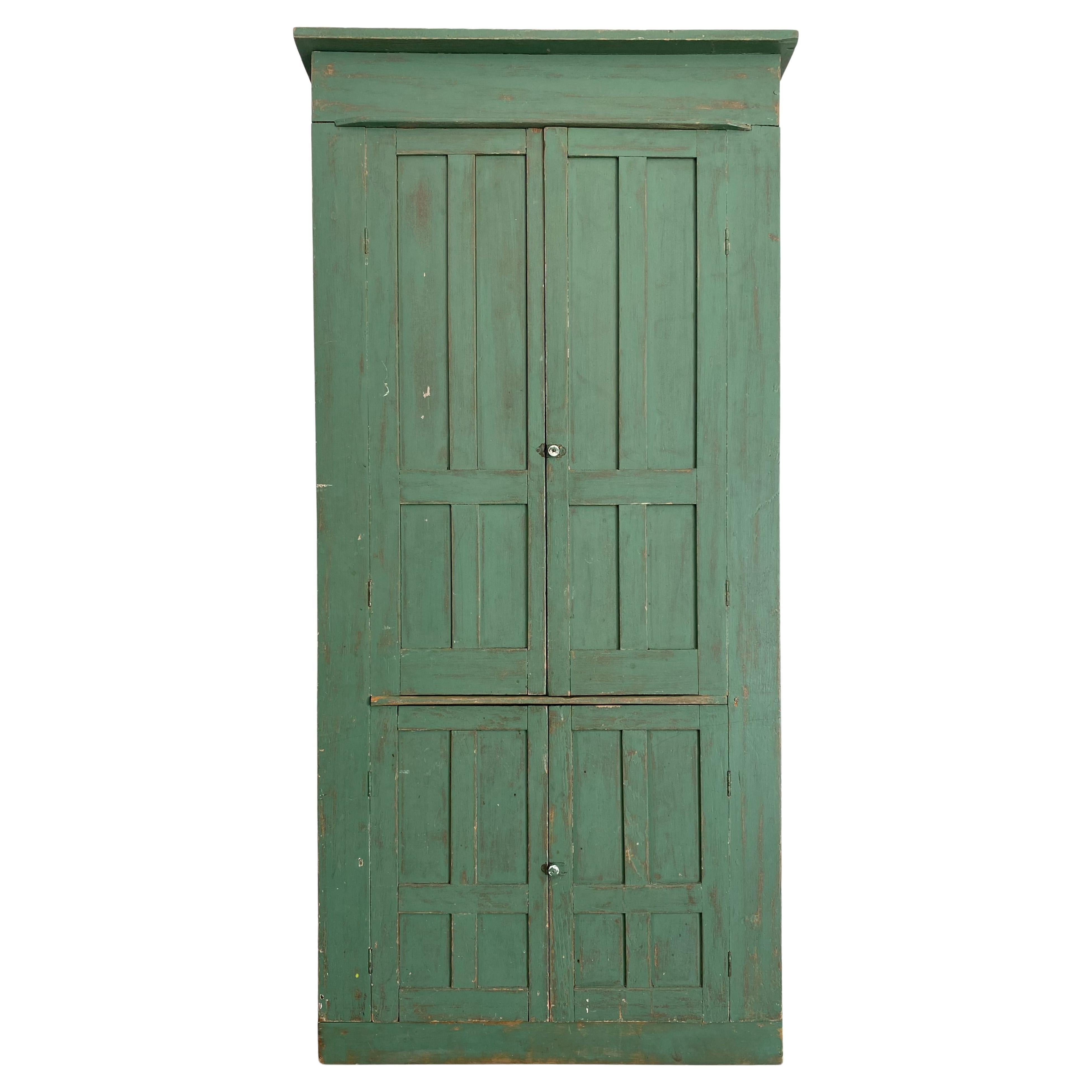 Primitive Painted Green Four Door Cabinet with Original Brass Sliding Lock