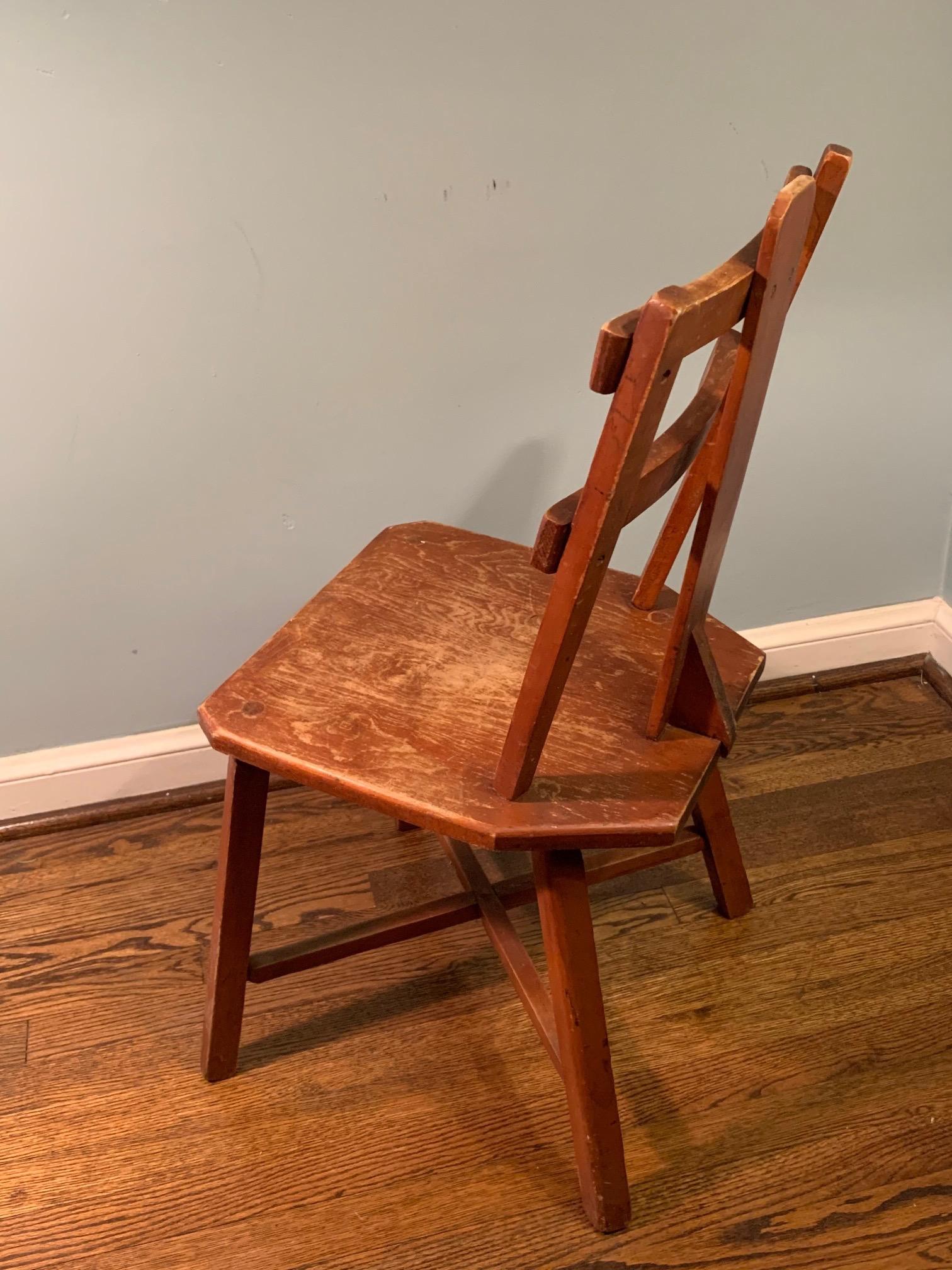 Fabulous pair of primitive cherrywood chairs in worn original finish reminiscent of Jean Touret. Wonderful lines coupled with a sophisticated yet primitive original design. Unmarked. Seat is 16” deep by 15.5” wide. Chair is 33” tall and seat rests