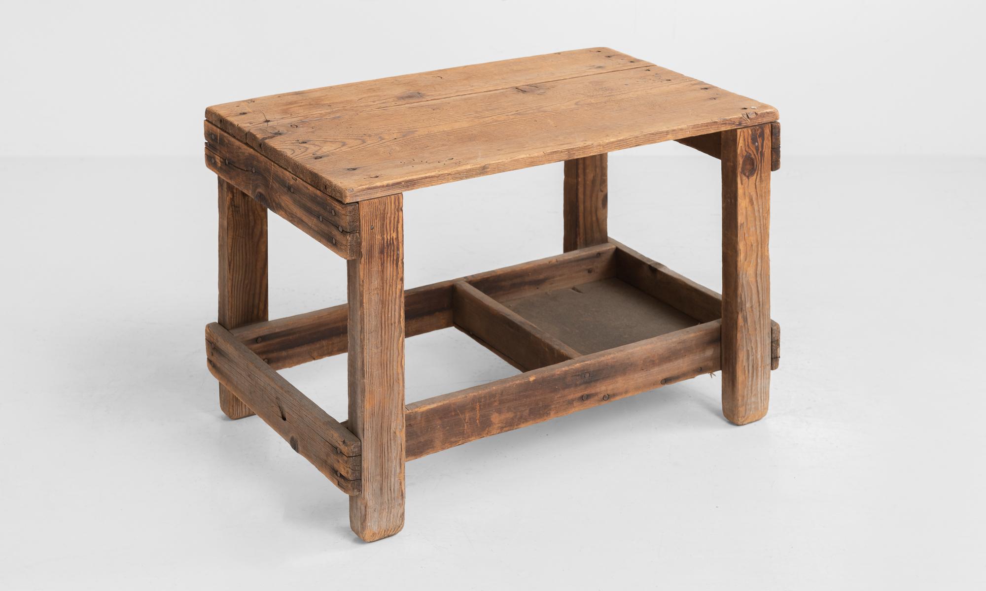 Primitive coffee table, America, circa 1930

Small work table with utilitarian construction and lower shelf.