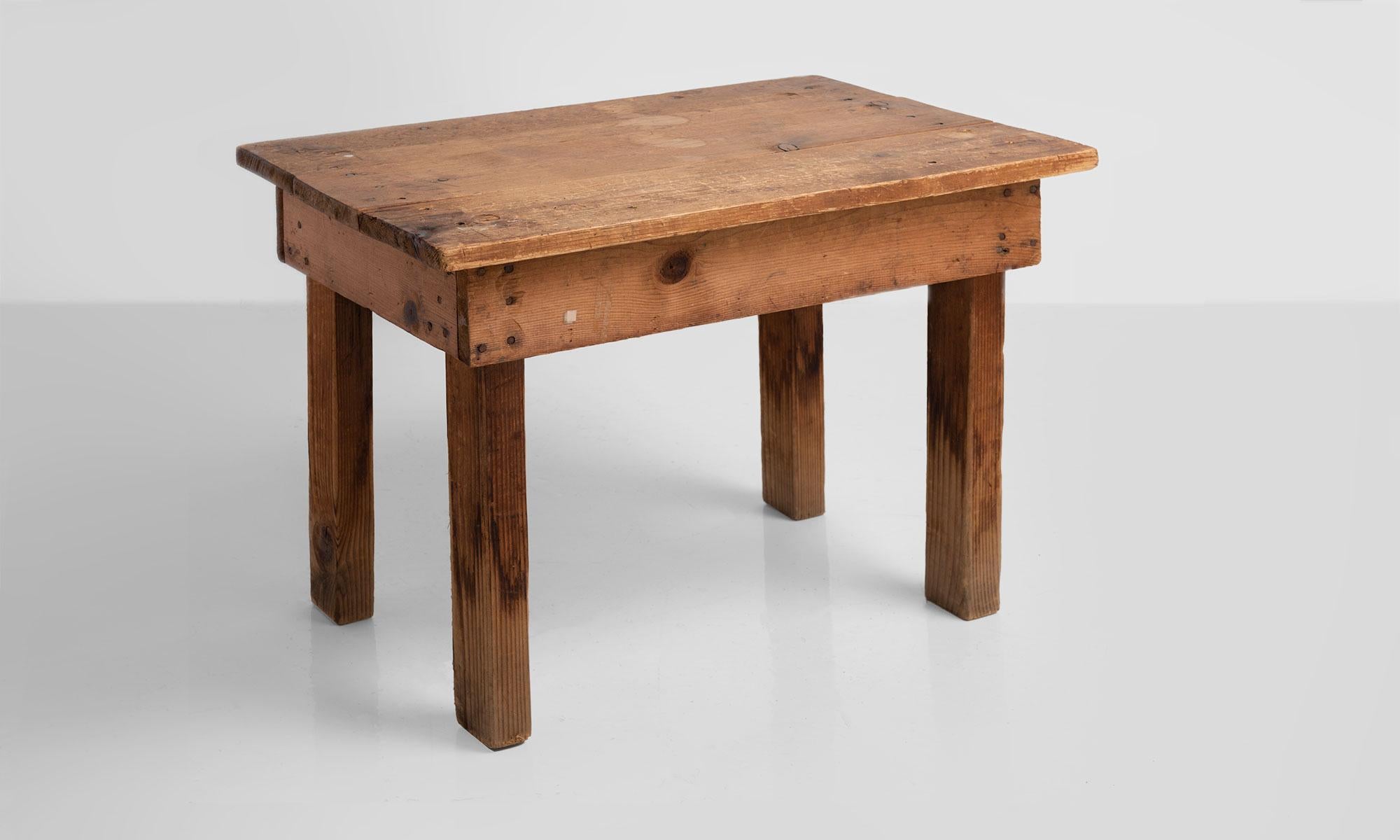 Primitive pine side table, America, circa 1900.

Simple form side table constructed in pine.