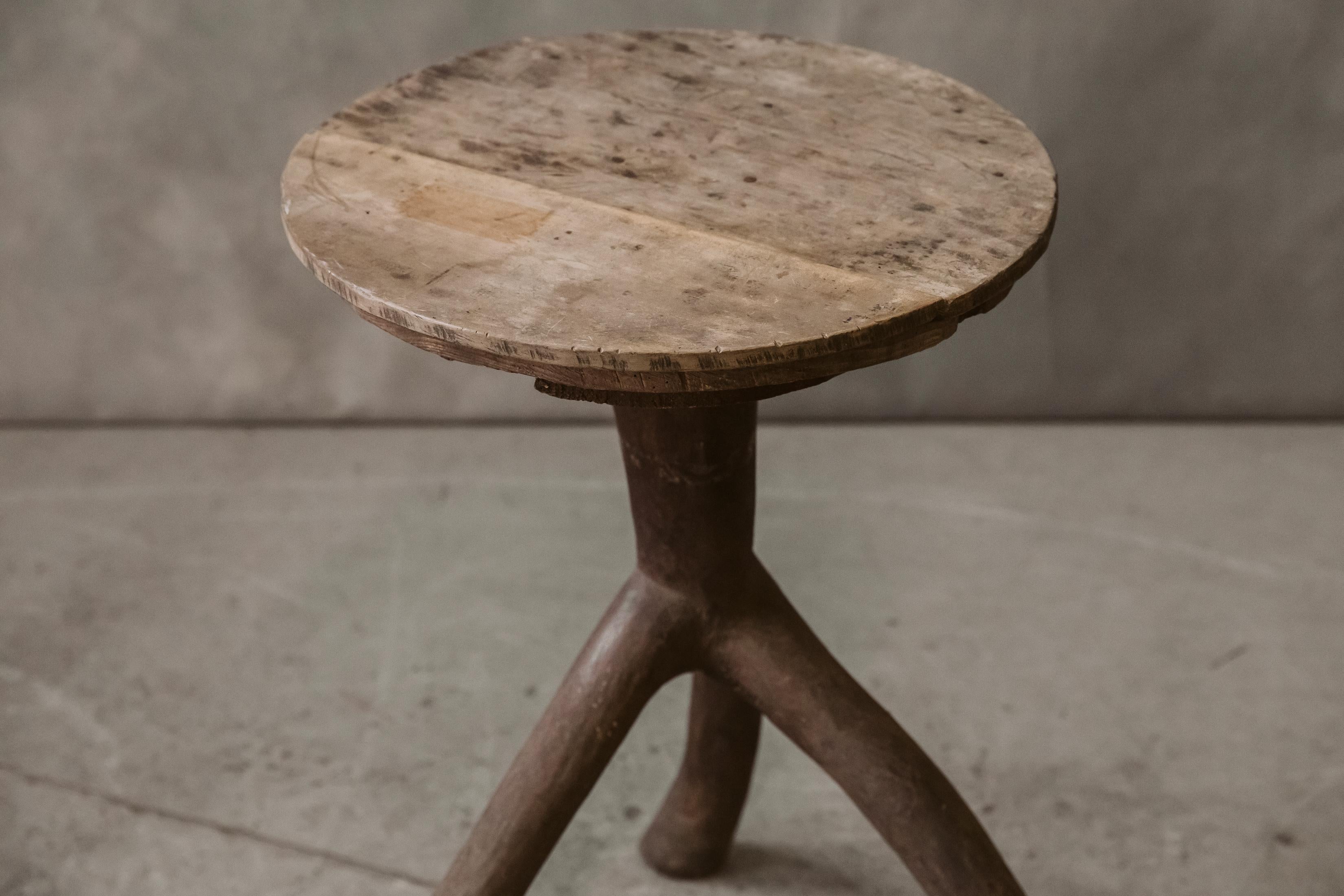 Primitive Pine side table from Sweden, Circa 1900. Solid pine branch base. Very nice patina and use. 

We don't have the time to write an extensive description on each of our pieces. We prefer to speak directly with our clients.  So, If you have any