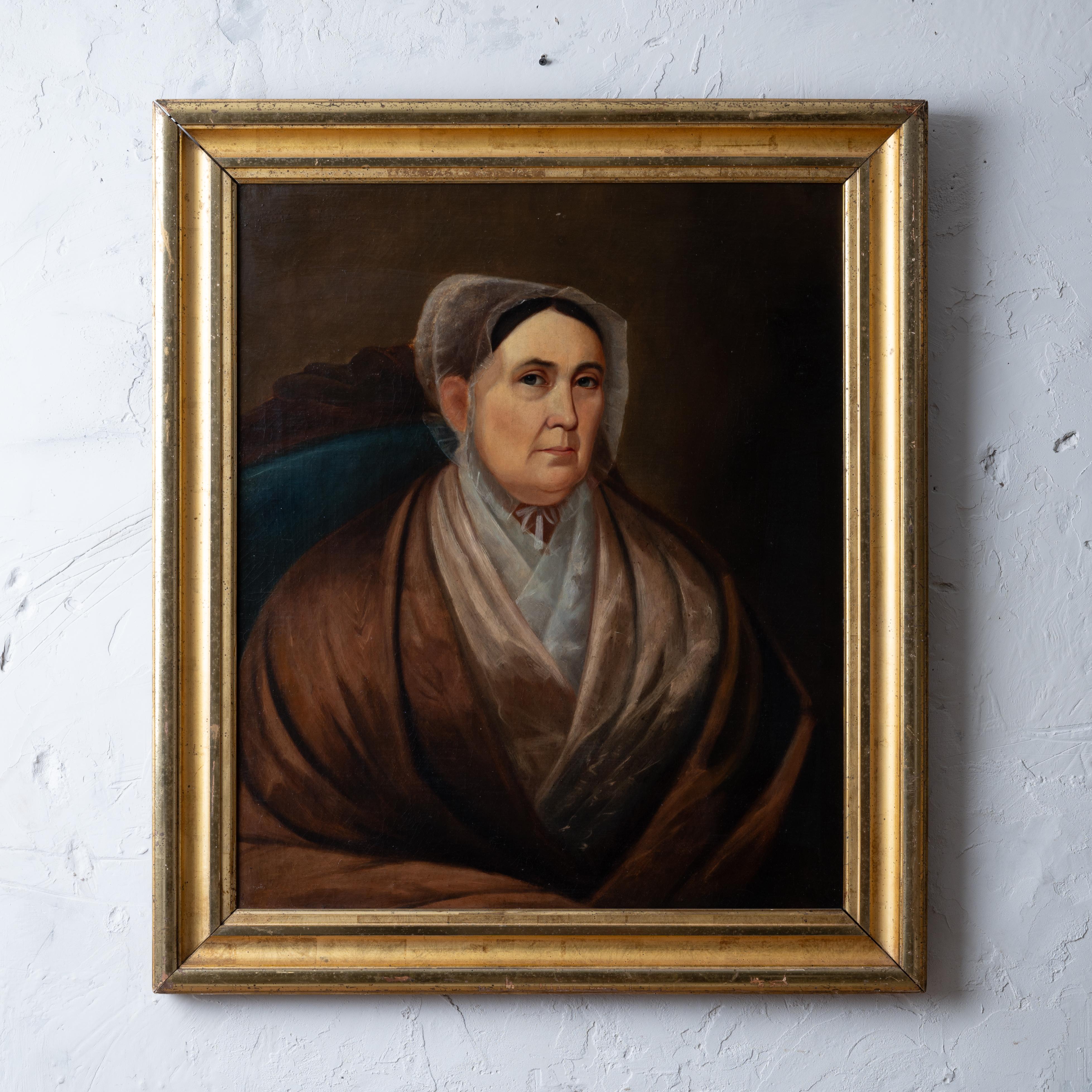 A primitive portrait of a lady, mid 19th century.

canvas: 25 by 30 inches
frame: 31 by 36 inches