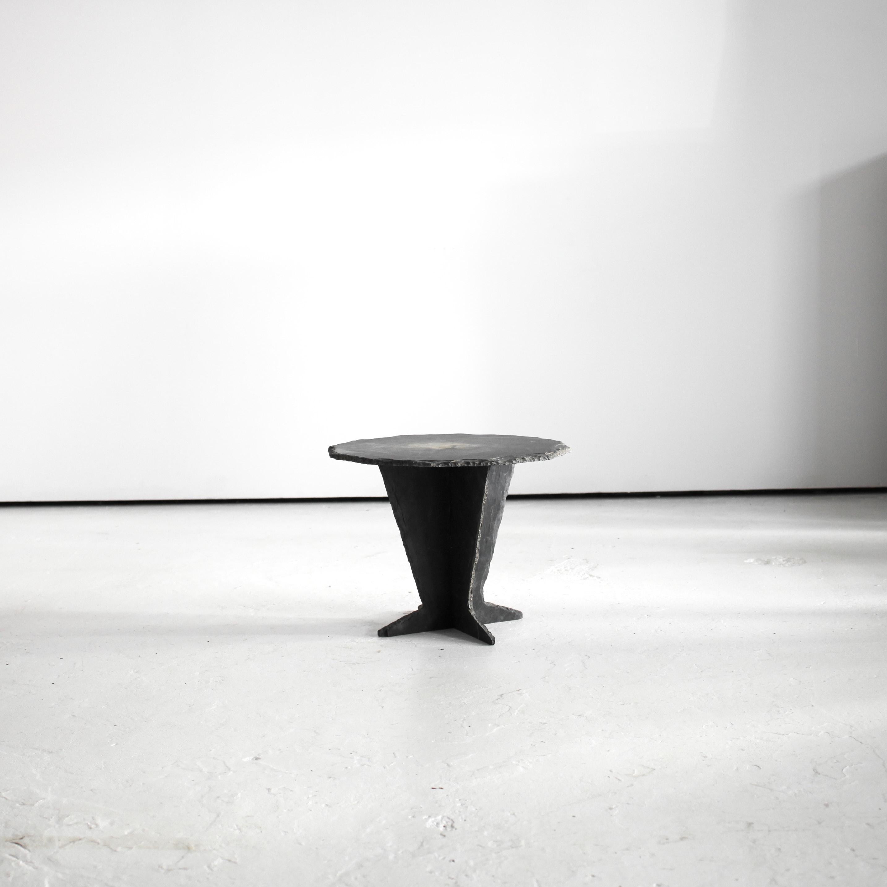 A primitive slate side table from the Angers region of France.

Made in the 1940s or 50s by a slate quarry worker.