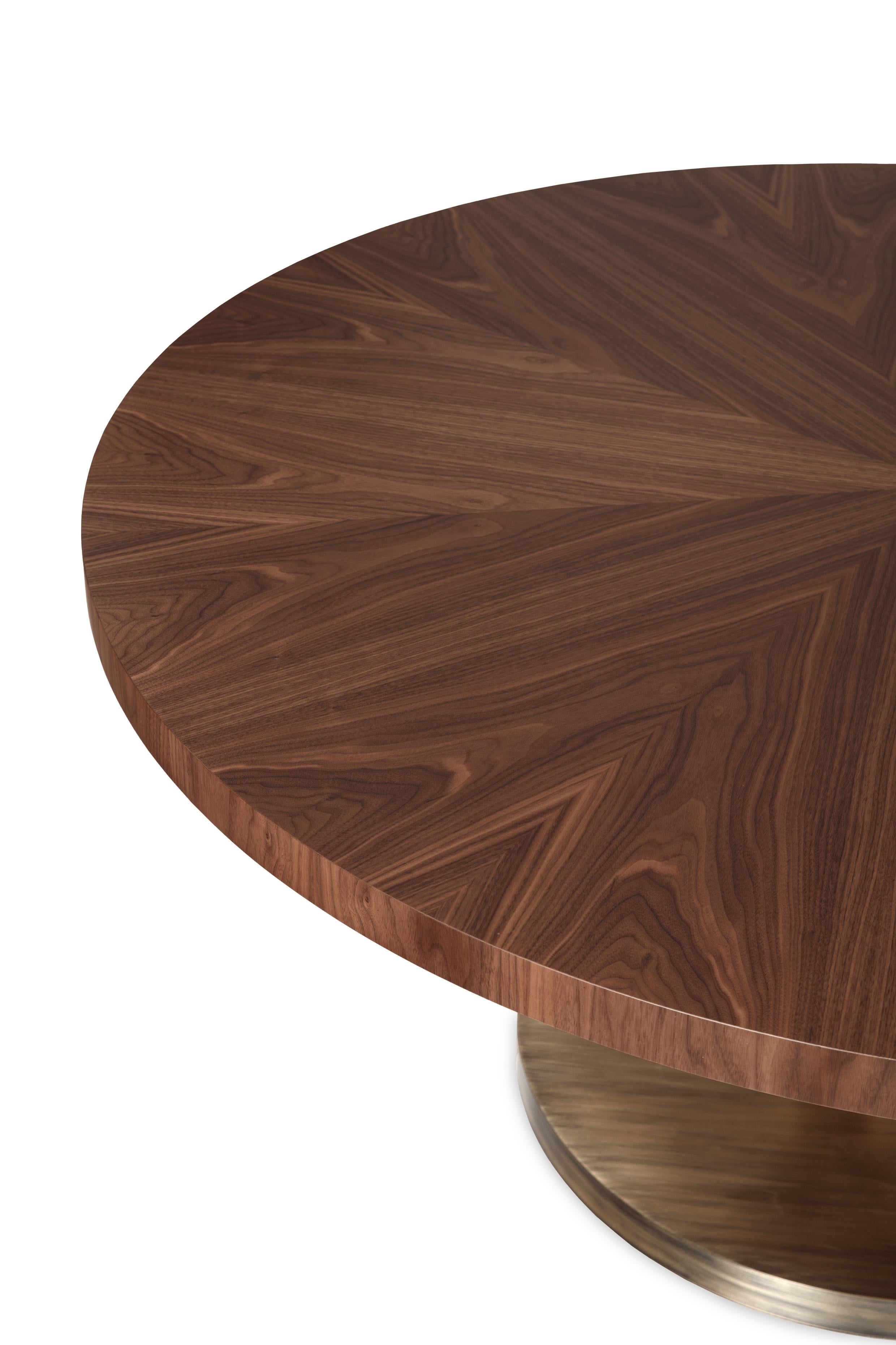 Primitive Round Dining Table by Ginger & Jagger
Dimensions: Ø 160 x H 74 cm. 
Materials: Brass and walnut.

This product is suitable for custom size. This product is made for living areas and interior spaces only. This product is not specified for