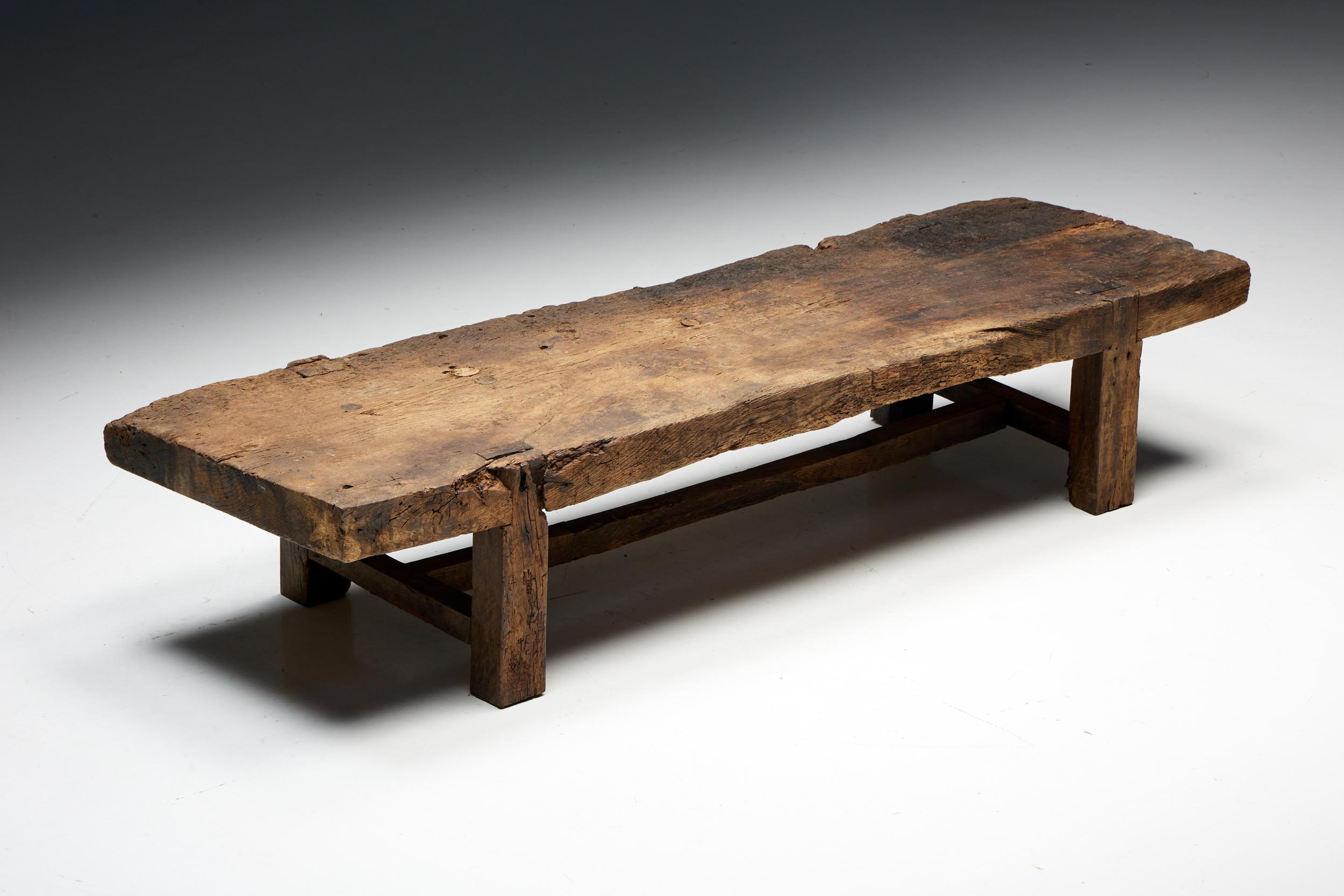 Primitive; Monoxylite; Rustic; Coffee Table; Wood; Wabi Sabi; Folk Art; Side Table; Patina; Wood; 1950s; Early 20th century; 

Primitive Rustic Rectangle Coffee Table - a timeless piece that captures the essence of the wabi-sabi style. Crafted