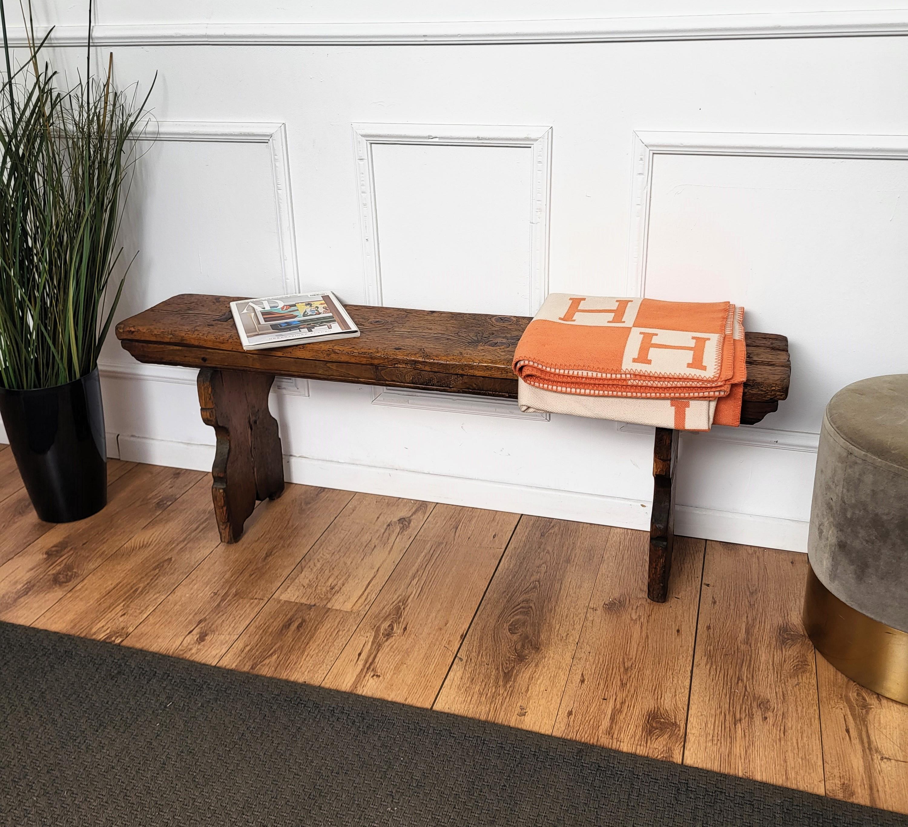 Beautiful Italian rustic primitive country wooden bench, with trestle style legs in original aged natural color giving the rich and beautiful patina that makes it look wonderful in every interior.

Solid wood constructions, beautiful wood grain,