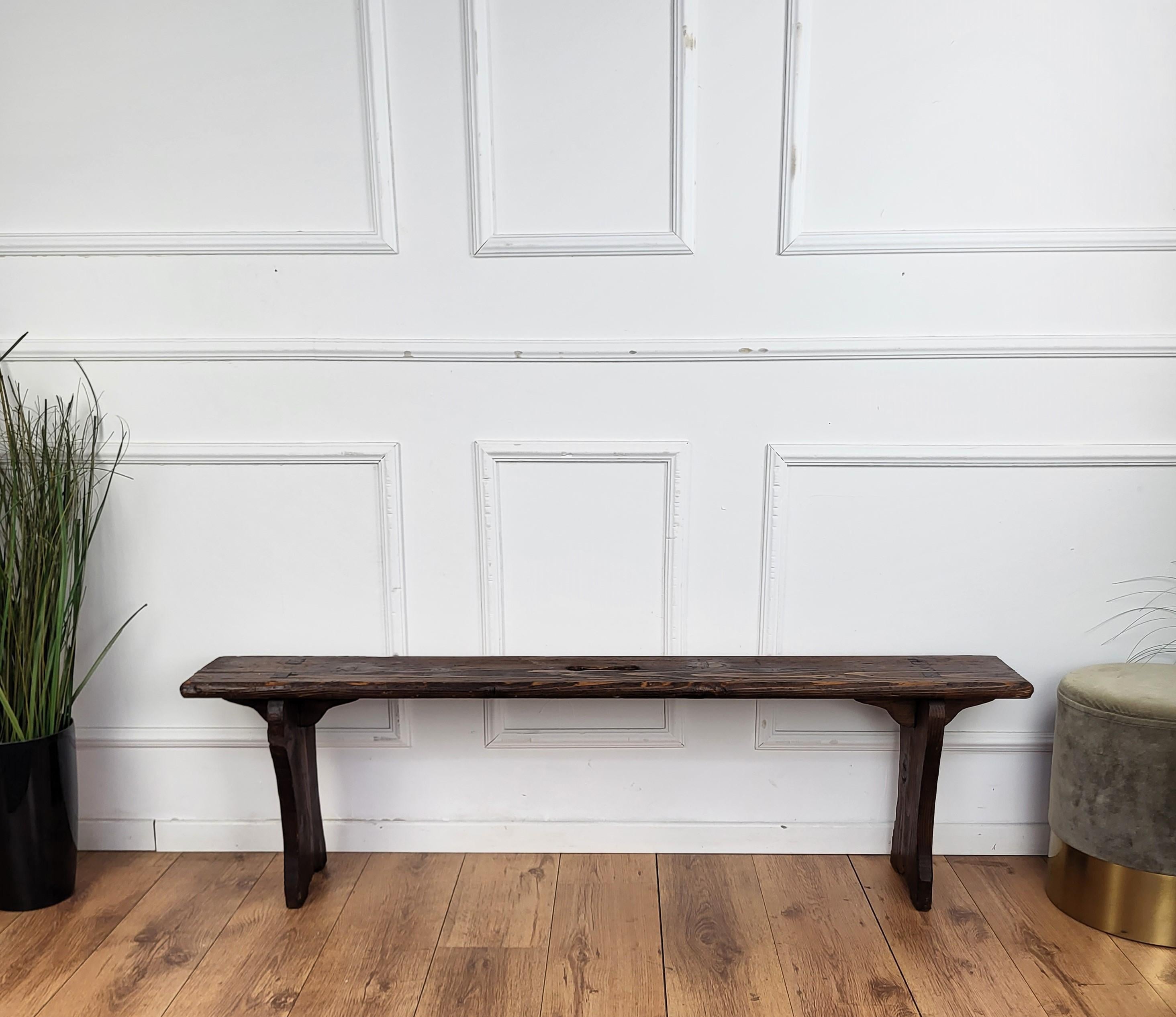 Beautiful Italian rustic primitive country wooden bench, with trestle style legs in original aged natural color giving the rich and beautiful patina that makes it look wonderful in every interior.

Solid wood constructions, beautiful wood grain,