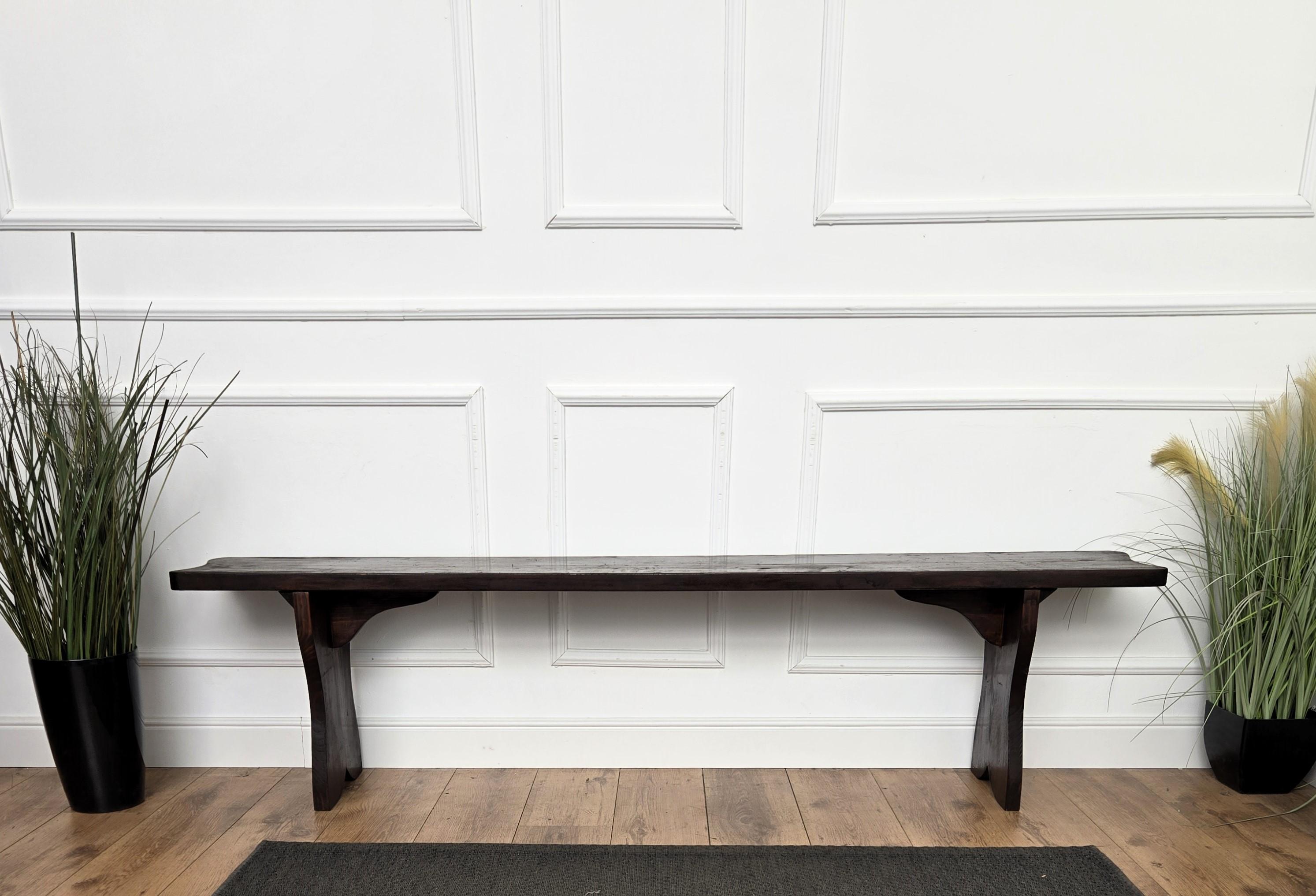 Beautiful Italian rustic primitive country wooden bench, with trestle style legs in original aged natural color giving the rich and beautiful patina that makes it look wonderful in every interior.

Solid wood constructions, beautiful wood grain,