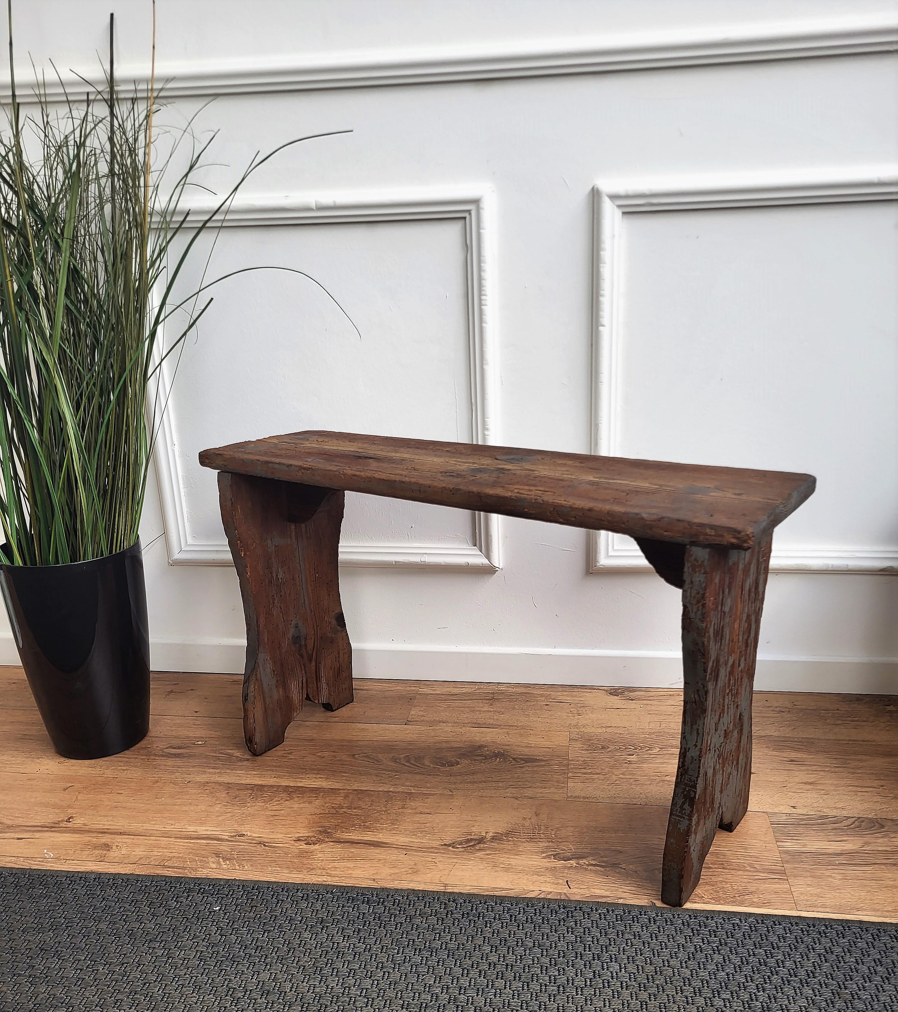 Solid wood construction, beautiful wood grain, distressed finish, very nice antique item with great style and form. In original beautifully aged natural color, it has some old gray paint on legs and top. This piece is in the rustic Primitive spirit