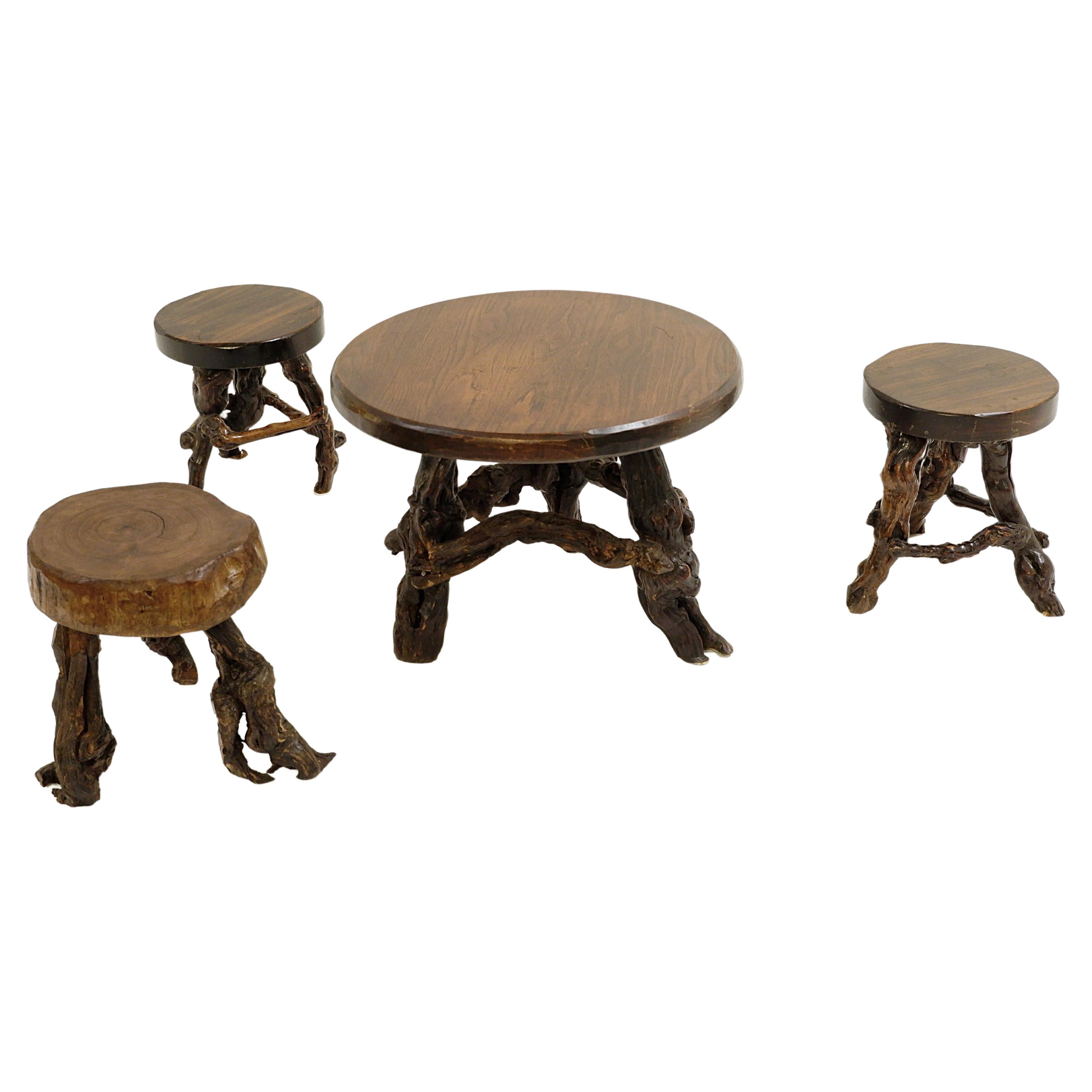 Primitive Set Tabls/Stools with Round Slab Seat and Legs Constructed from Vines For Sale
