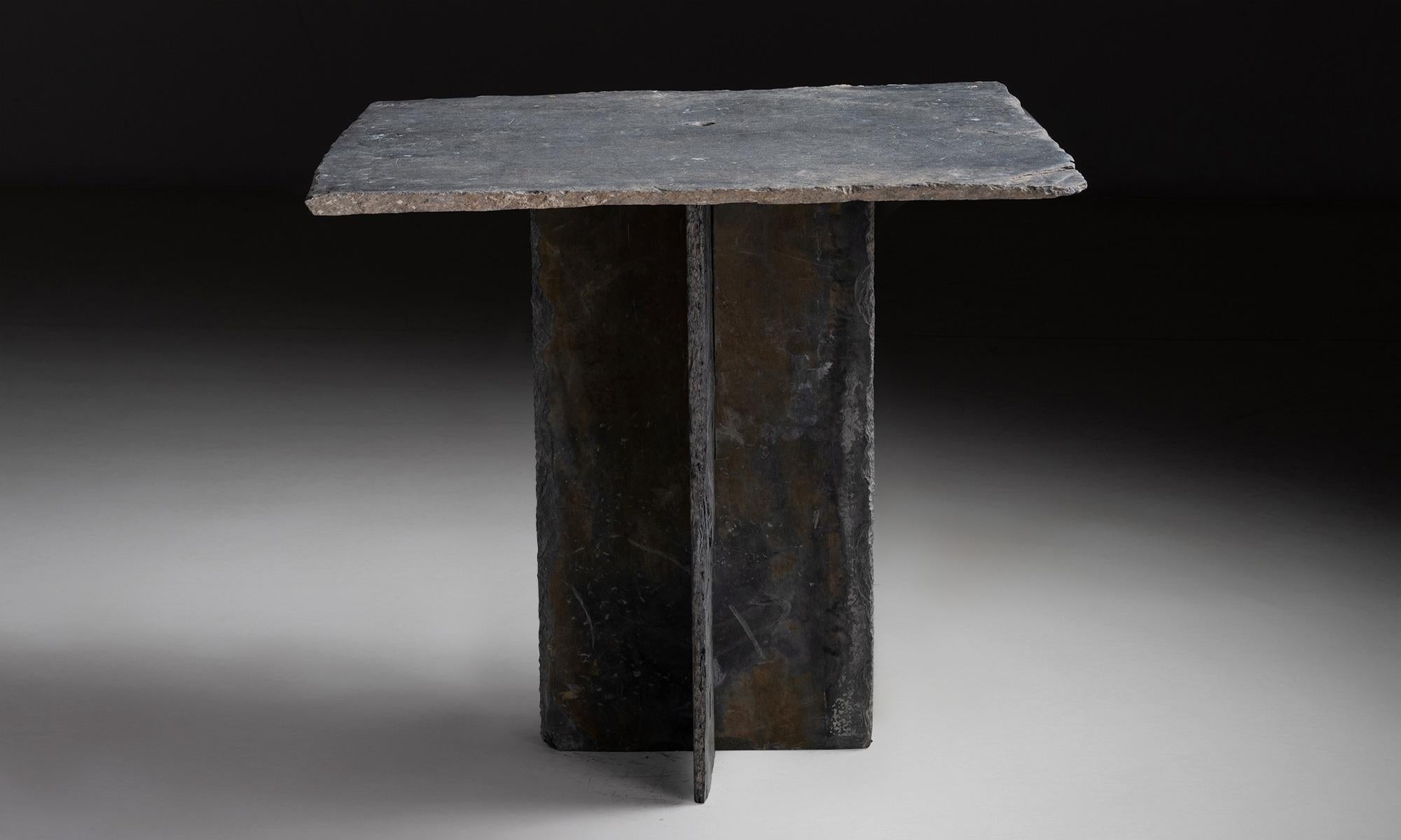 Primitive slate square table

France, circa 1910

Square slate top on Intersecting base.

Measures: 32”L x 30.5” D x 29.25” H.
 