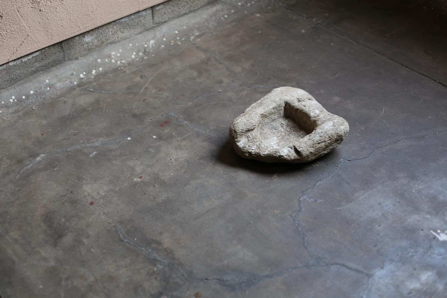 This is an old stone object obtained from France.

A primitive object with a square carved out of the middle.

It is a beautiful stone with a faint silver color on the surface in places.

We assume that it was originally used as a feeding dish for