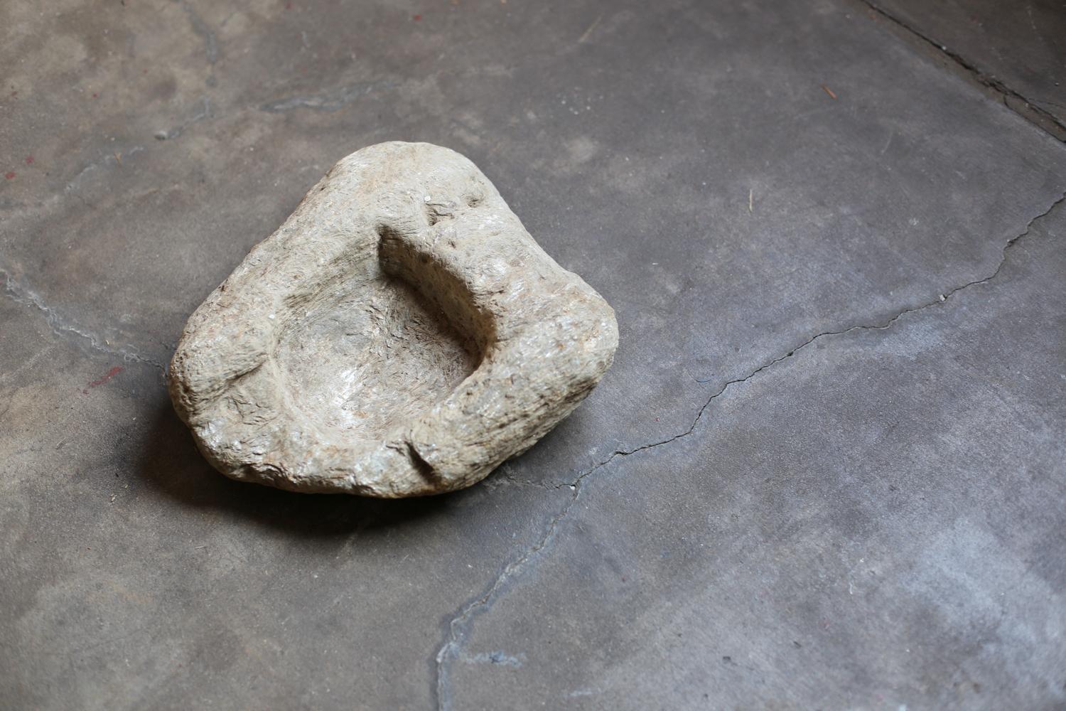 French Primitive Stone Object with a square recess from France