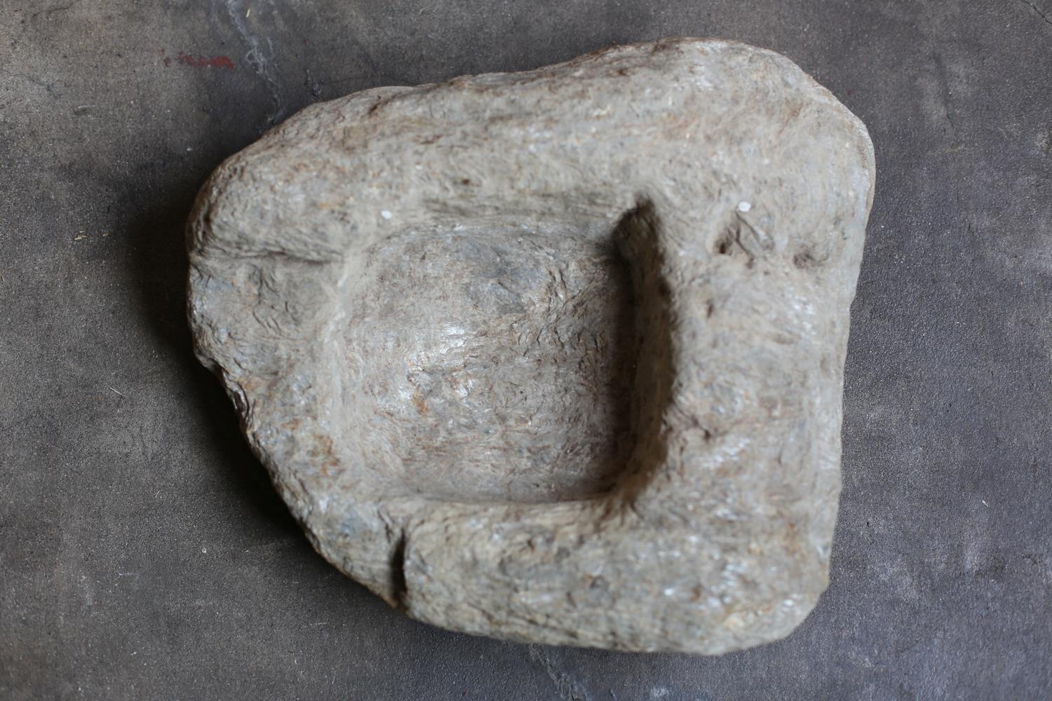 Primitive Stone Object with a square recess from France 2