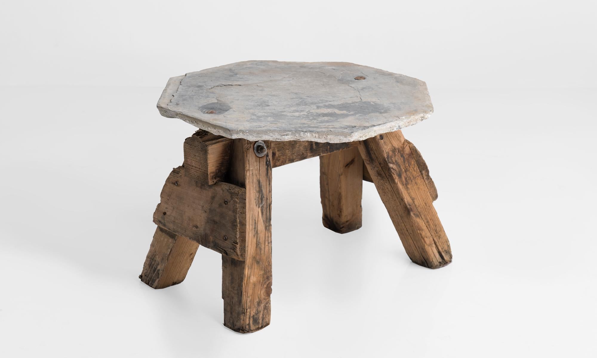 Primitive stone and timber side tables, France, circa 1950.

Simple construction with rustic patina.

 