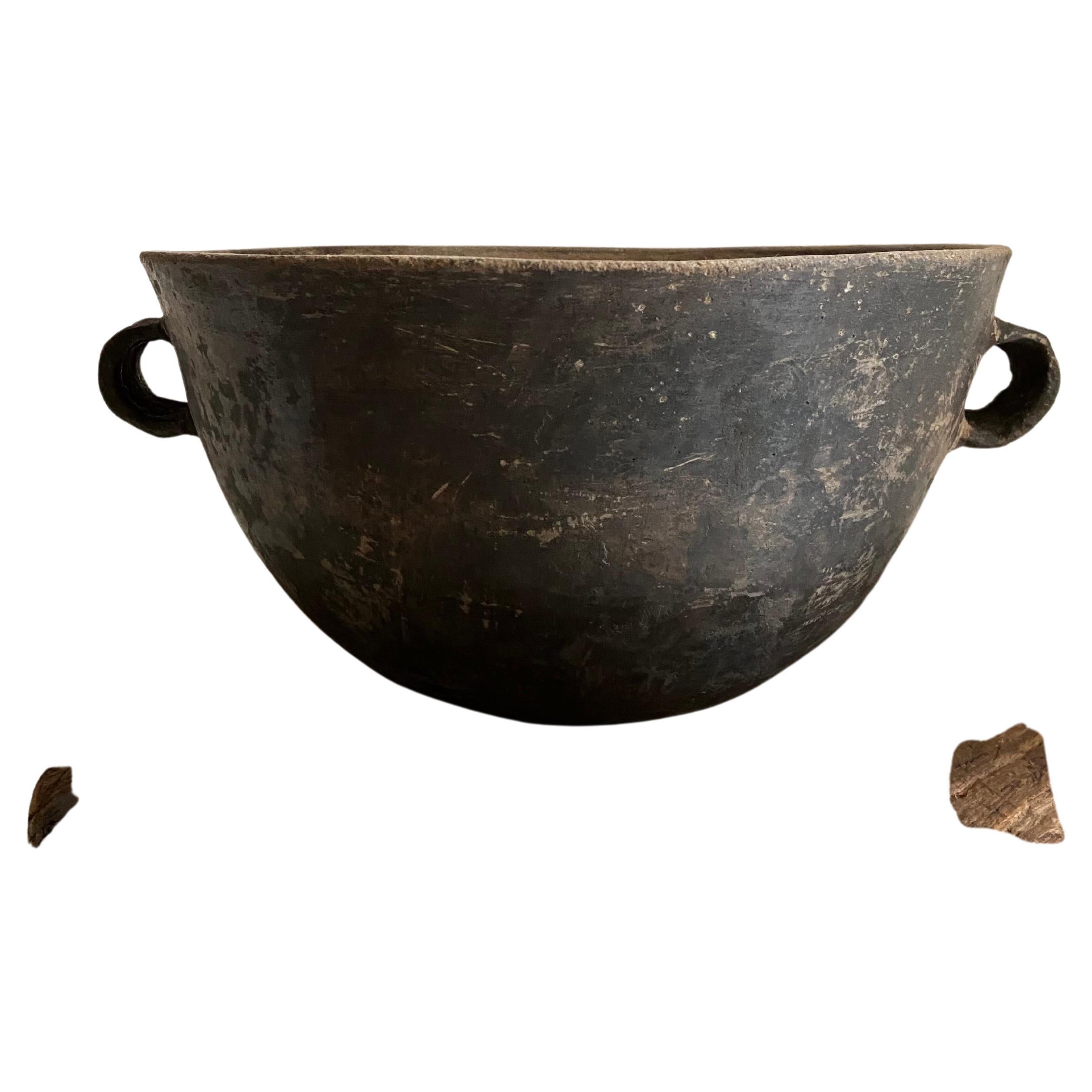Primitive style cazuela bowl from Los Reyes Metzontla, Puebla (Mexico). The style of this vessel exemplifies the most primitive of the designs from this community.
