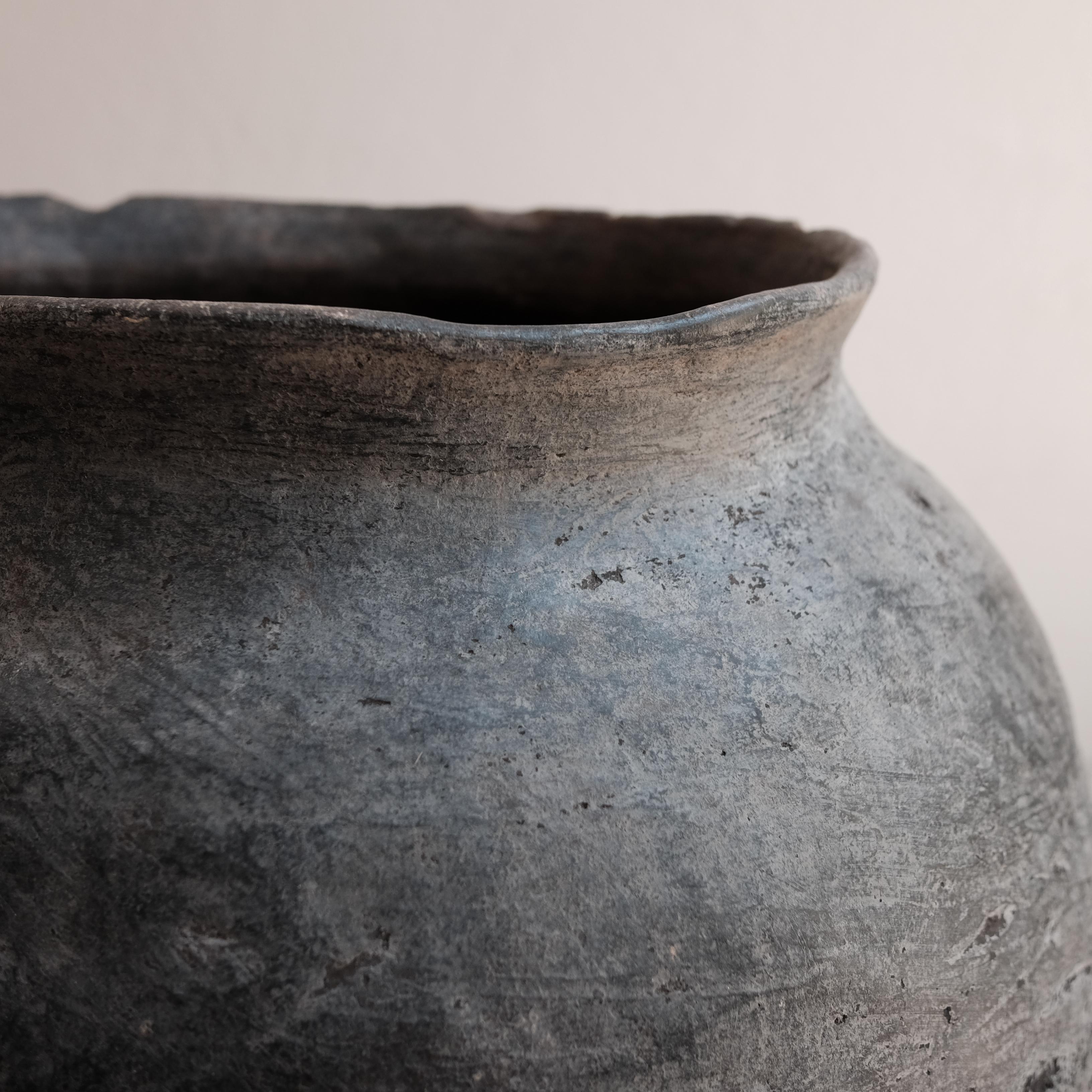 Primitive charcoal colored ceramic jar from San Lorenzo Texmelucan, Oaxaca, Mexico, circa 1940s.