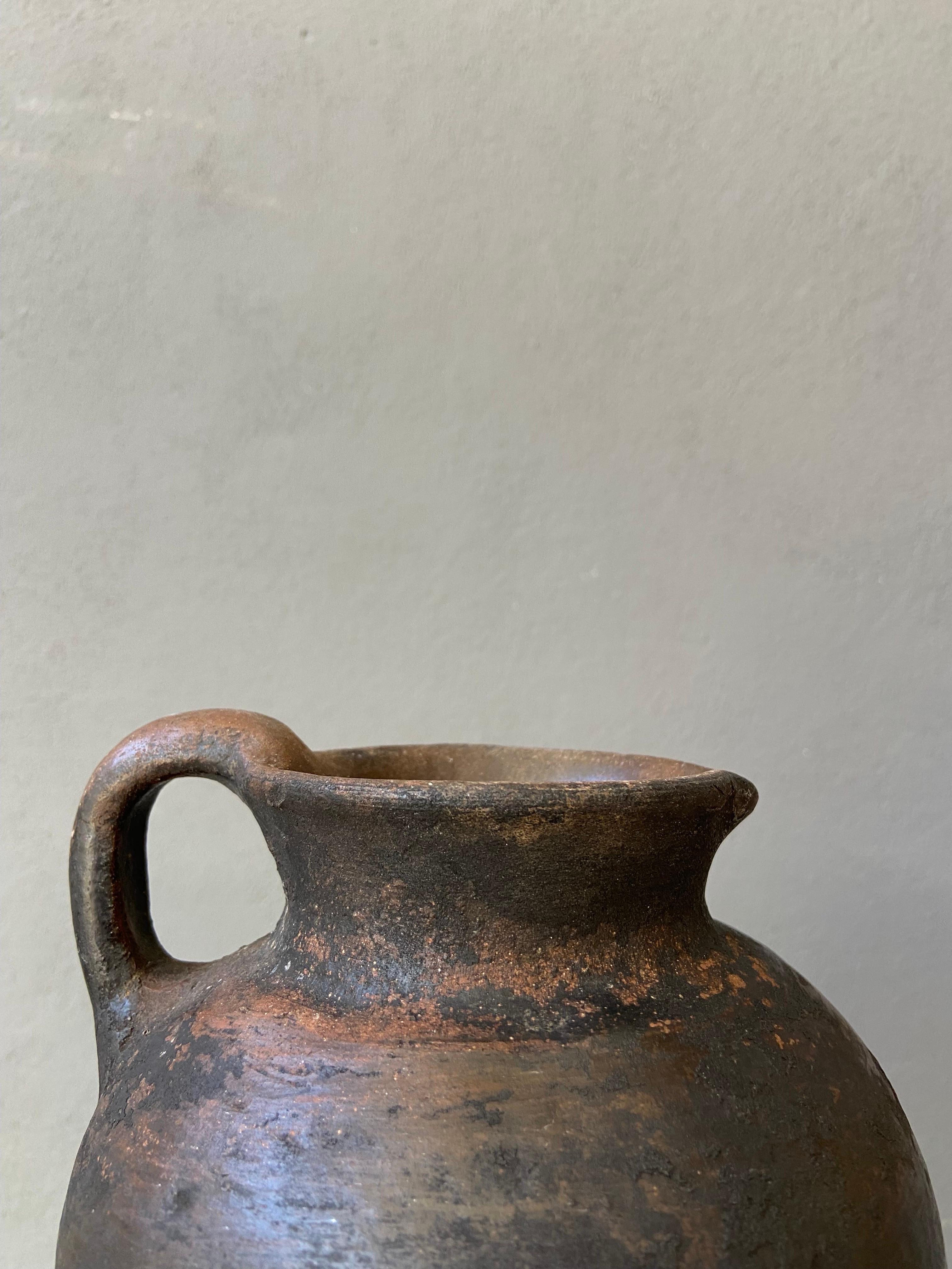 Primitive styled terracotta pitcher from the Mixteca region of Oaxaca, Mexico, circa 1970´s.