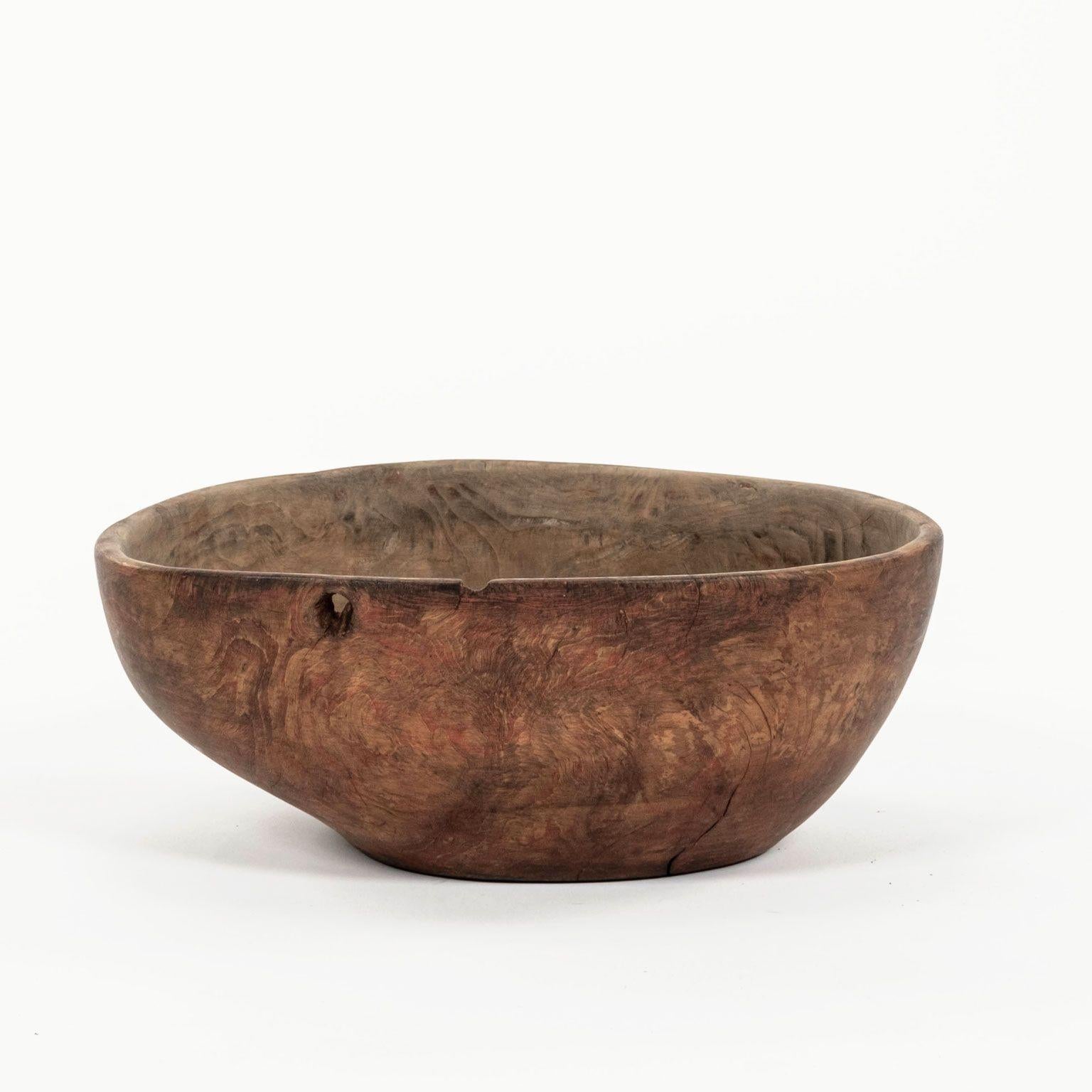 Primitive Swedish burl root wood dugout bowl with traces of exterior red paint dates to the late 19th century. Beautiful burl grain patterns. Inscribed and dated 