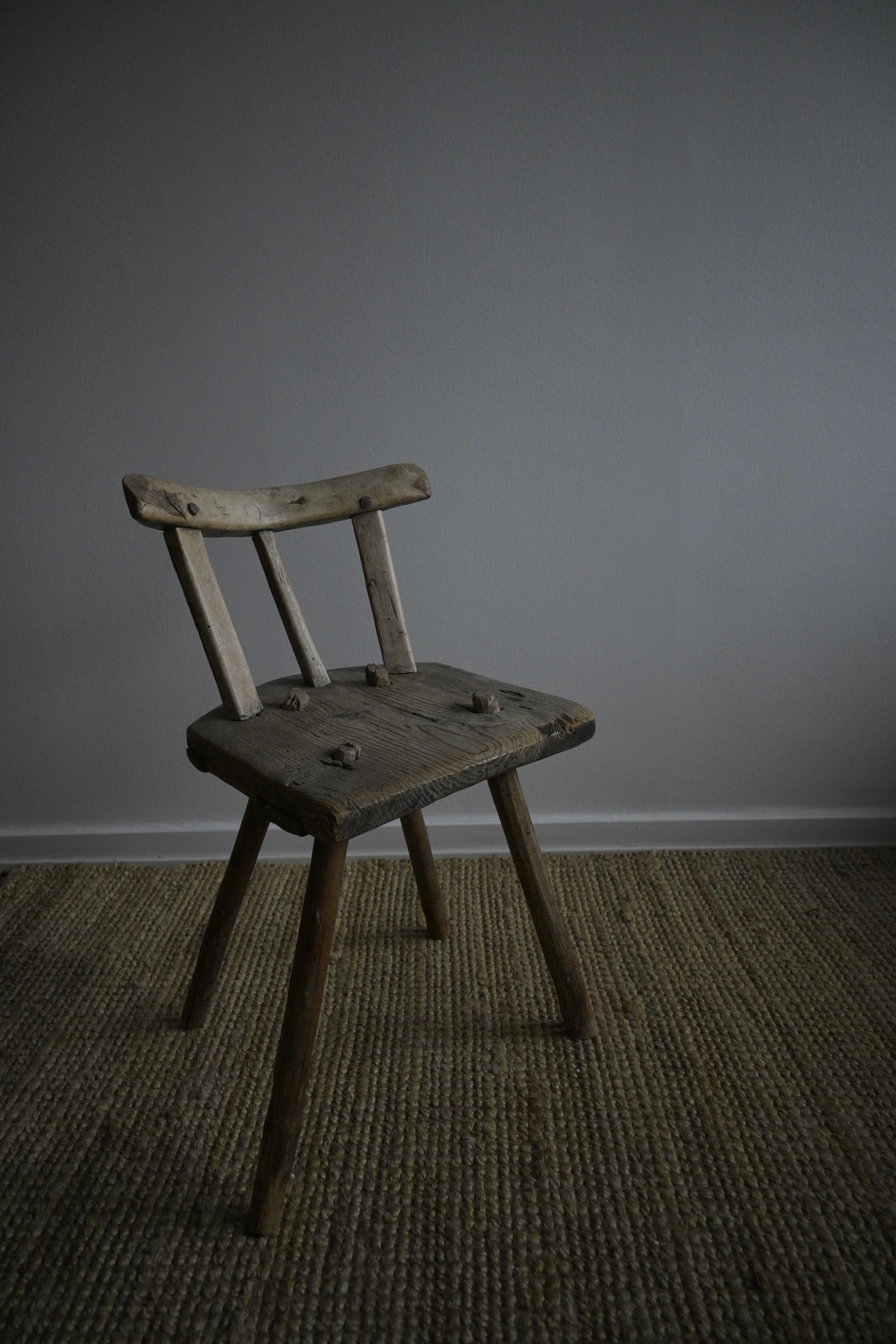 Primitive Swedish Child Stool early-18th century

Made of Pine wood and the backrest is made of birch wood.
Beautiful patina and smooth surface, wear consistent with age and use.

Height: 55cm /21.6 inch
Width: 30 cm /11.8 inch
Depth: 28 cm /11