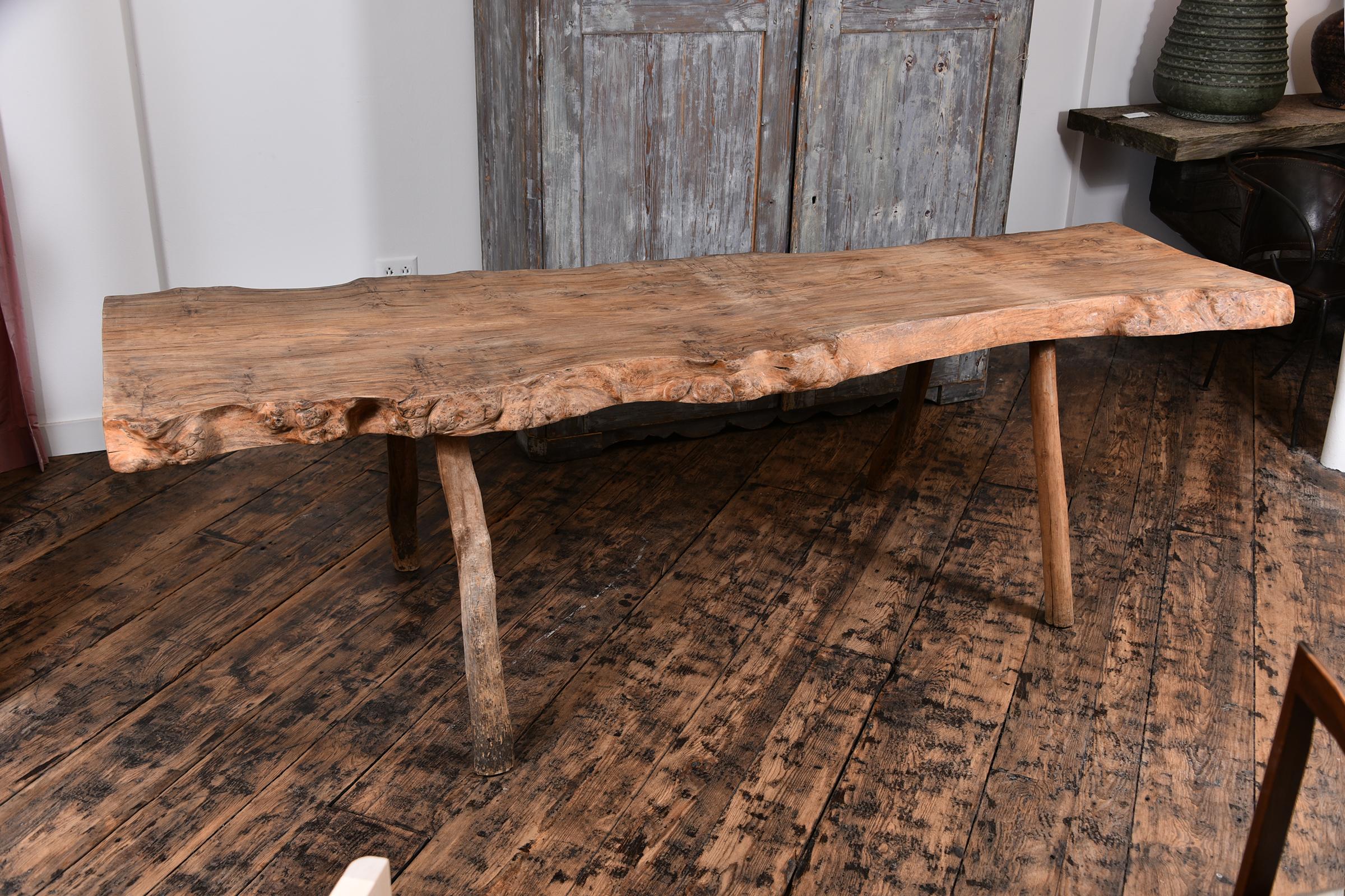 19th century French Primitive table with live edge, could be used as a desk or console.
 