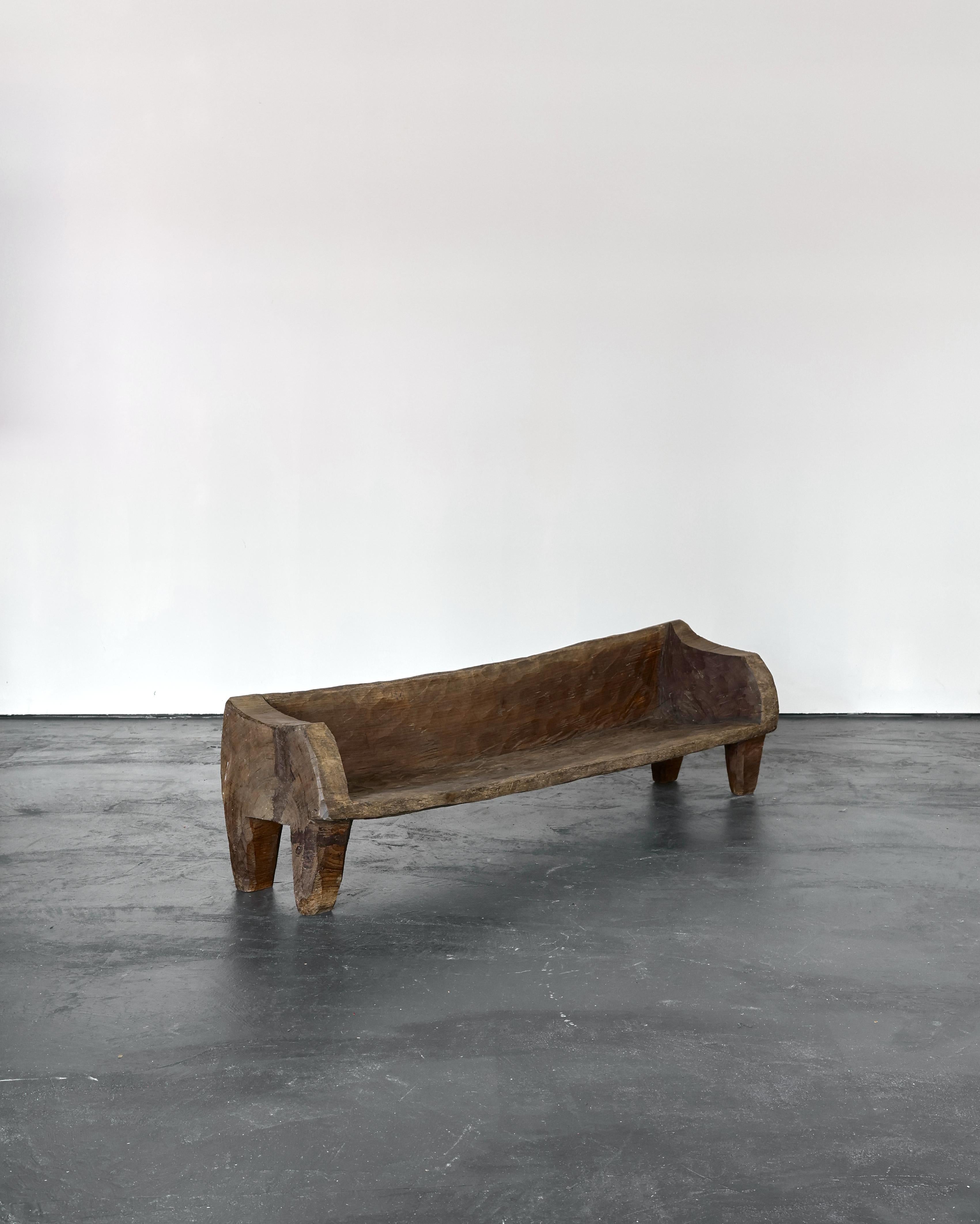 A chunky mid 20th century primitive dug-out bench very much in the style of Zanine Caldas. 

Sourced in the Netherlands, origin unknown but believed to be French.

Bleached out and nicely worn with a couple of old repairs.