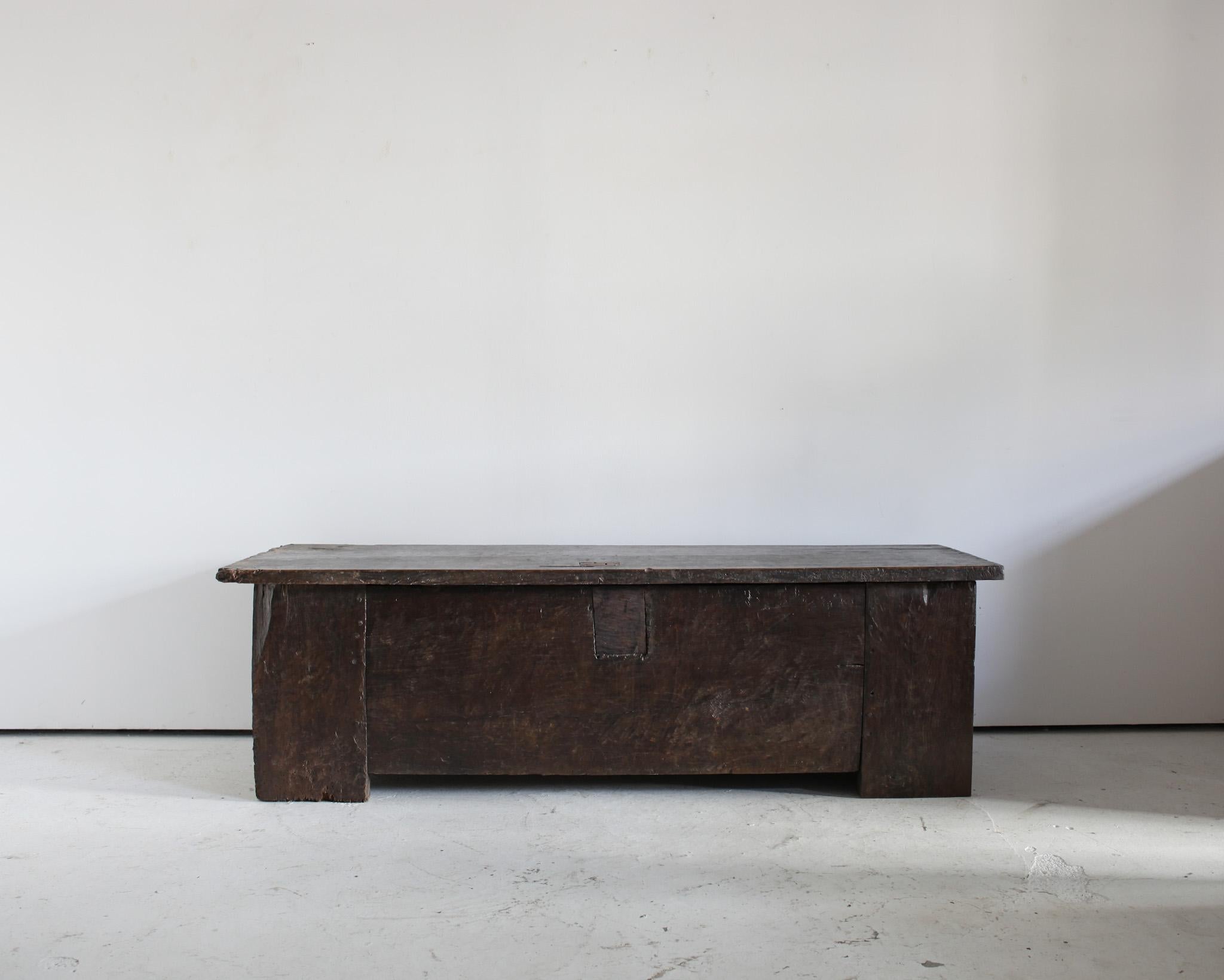 An XL 17th C. Spanish Coffer constructed from thick slabs of chestnut with substantial walnut top.

Heavily patinated over its 300+ year life.

Perfect as a low console.

Sympathetically restored in our London workshop.