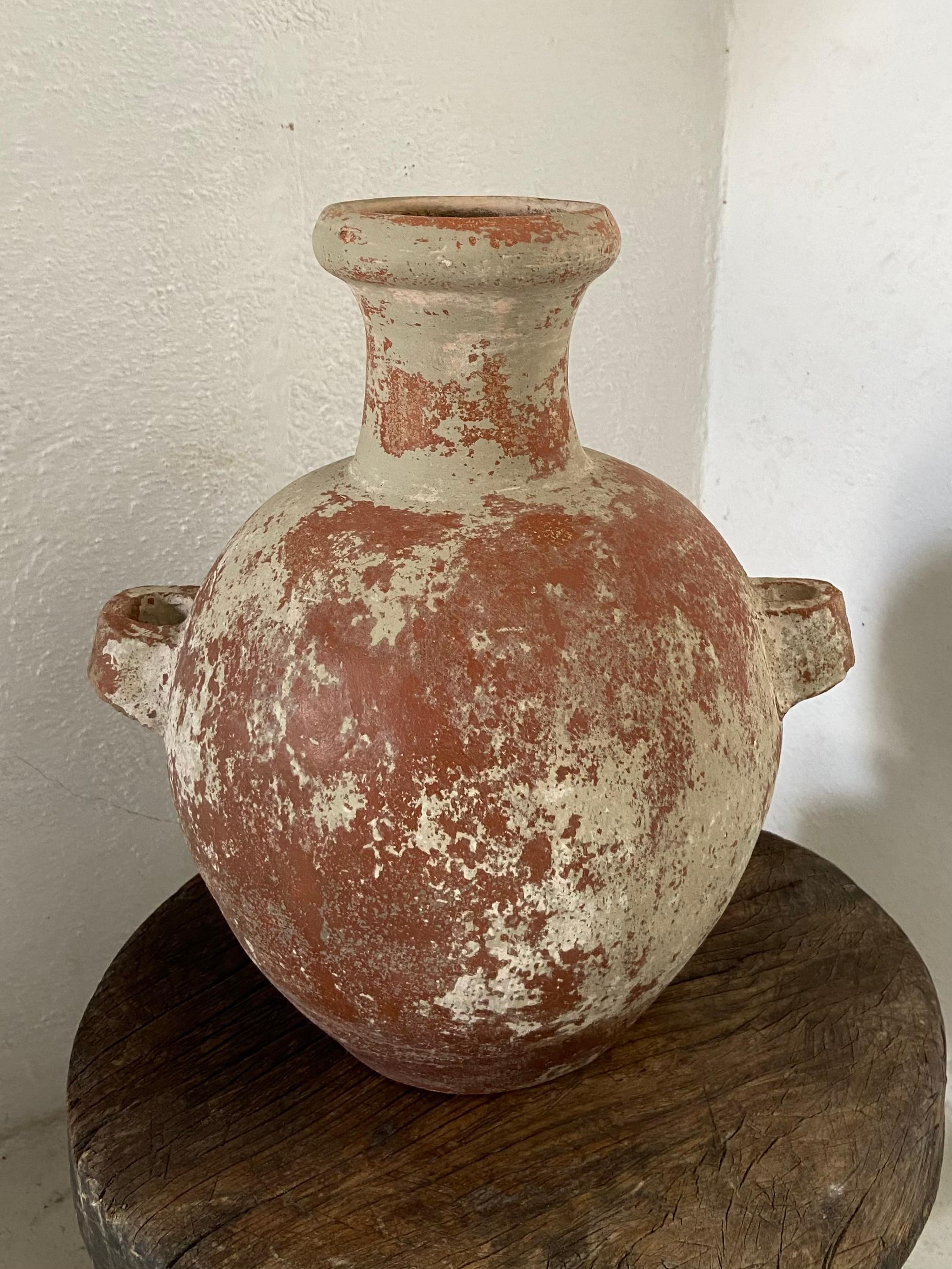 Primitive Water Vessel by Artefakto
Unique piece.
Dimensions: Ø 31 x H 35 cm.
Materials: Terracotta. 

Central Yucatan, Mexico. Early 1900s.

Artefakto opened its doors on the Riviera Nayarit coastline in 2010. With an unrelenting passion for
