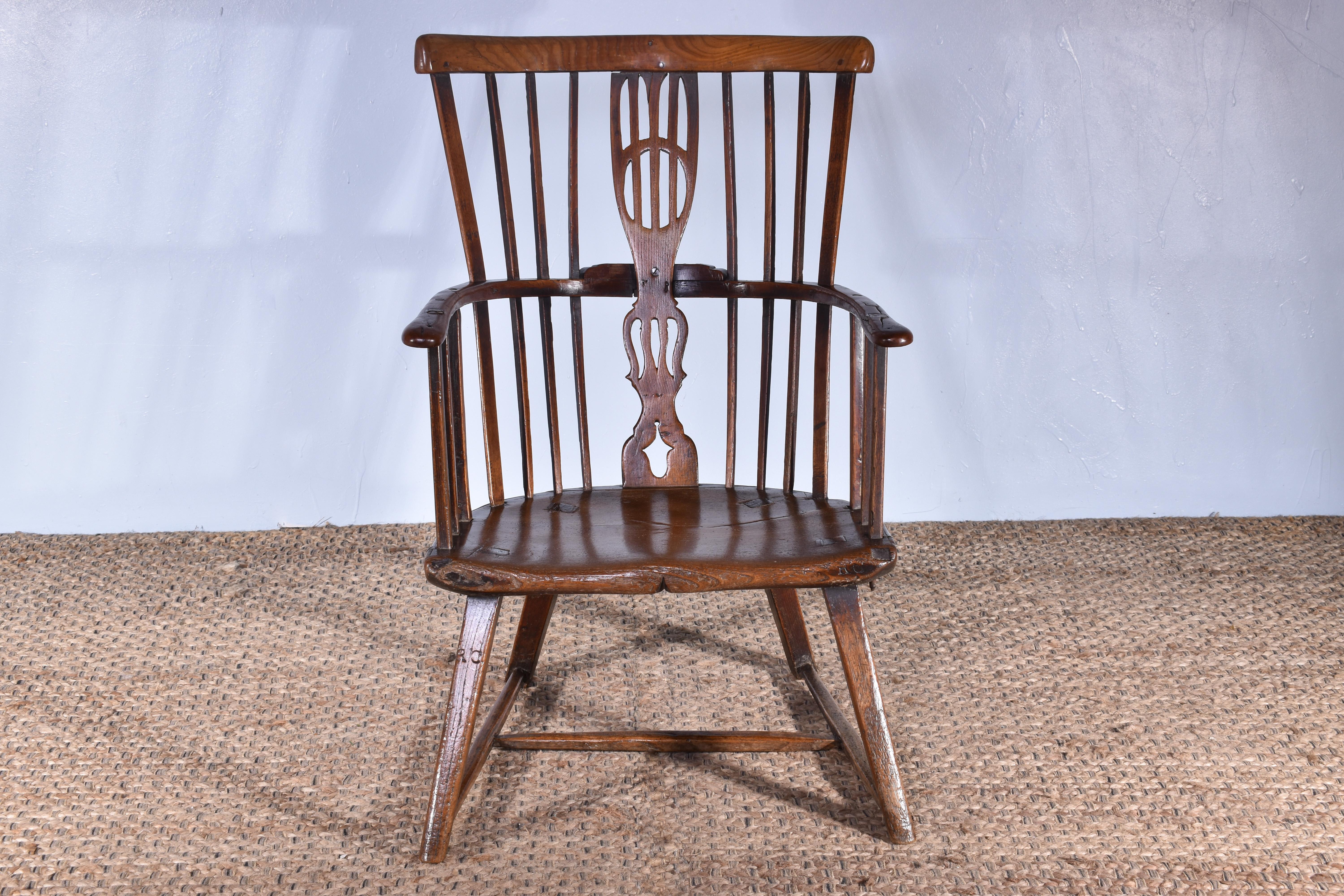 A unique eighteenth century primitive Windsor armchair.

This original handmade country armchair is constructed entirely from solid elm.

With several charming makers stamps ‘RC’ they were obviously very proud of their efforts.

