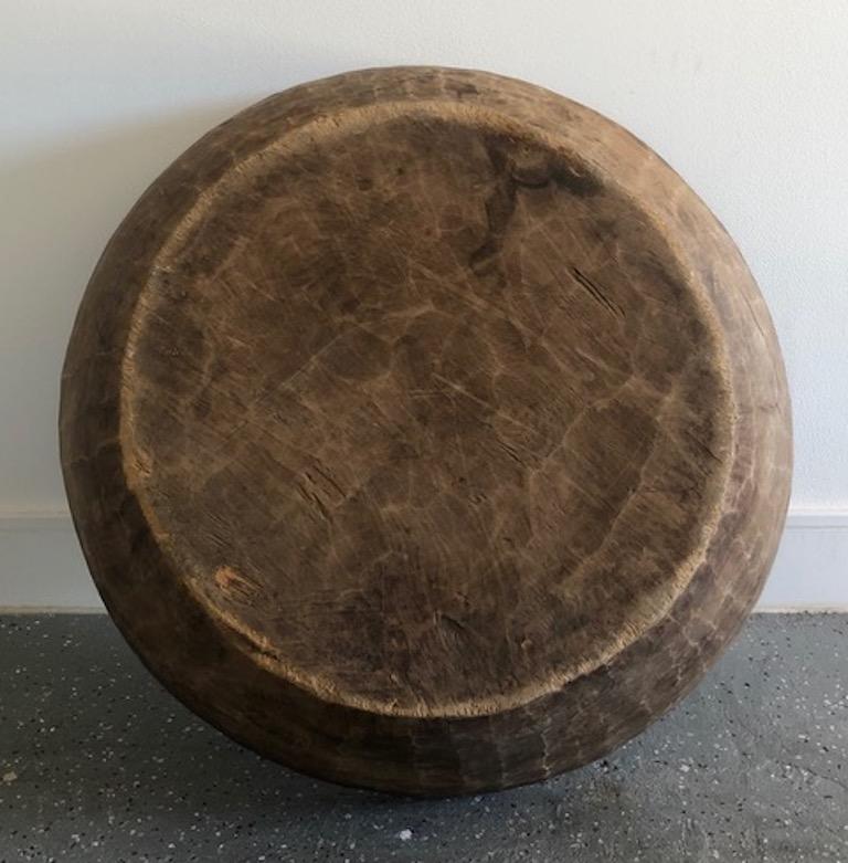 Primitive root bowl of worn wood with rich brown patina from Japan.