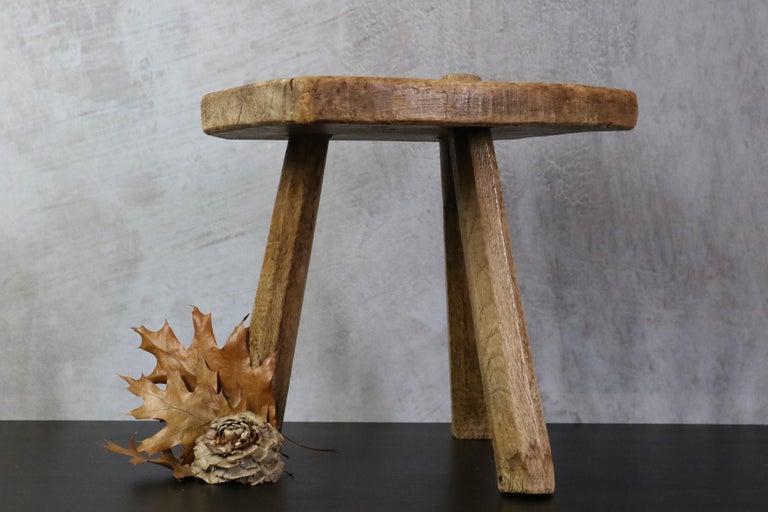Primitive wooden brutalist stool, France, french folk art, circa 1900.

French milking stool or tripod stool. Traditional construction method without hardware.
 